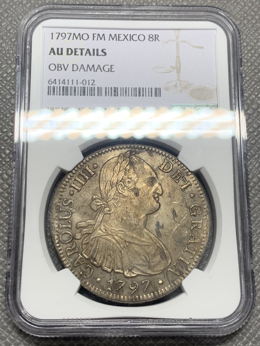 《竞宝斋》第130场-周日，周一连拍 (全场包邮) NGC-AU 墨西哥 1797年 卡四 双柱 8R 大银币 正反深打细节好 背面墙砖清晰