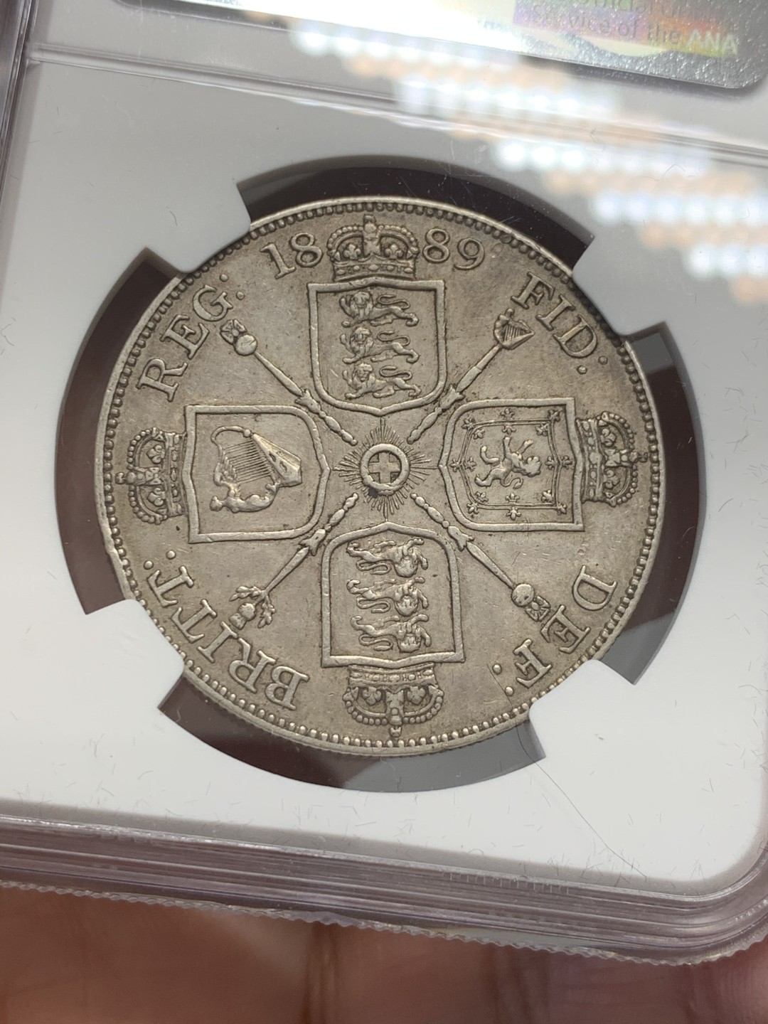 《竞宝斋》第131场-周日，周一连拍 (全场包邮) NGC XF 英国1889年维多利亚高冠双弗洛林大银币