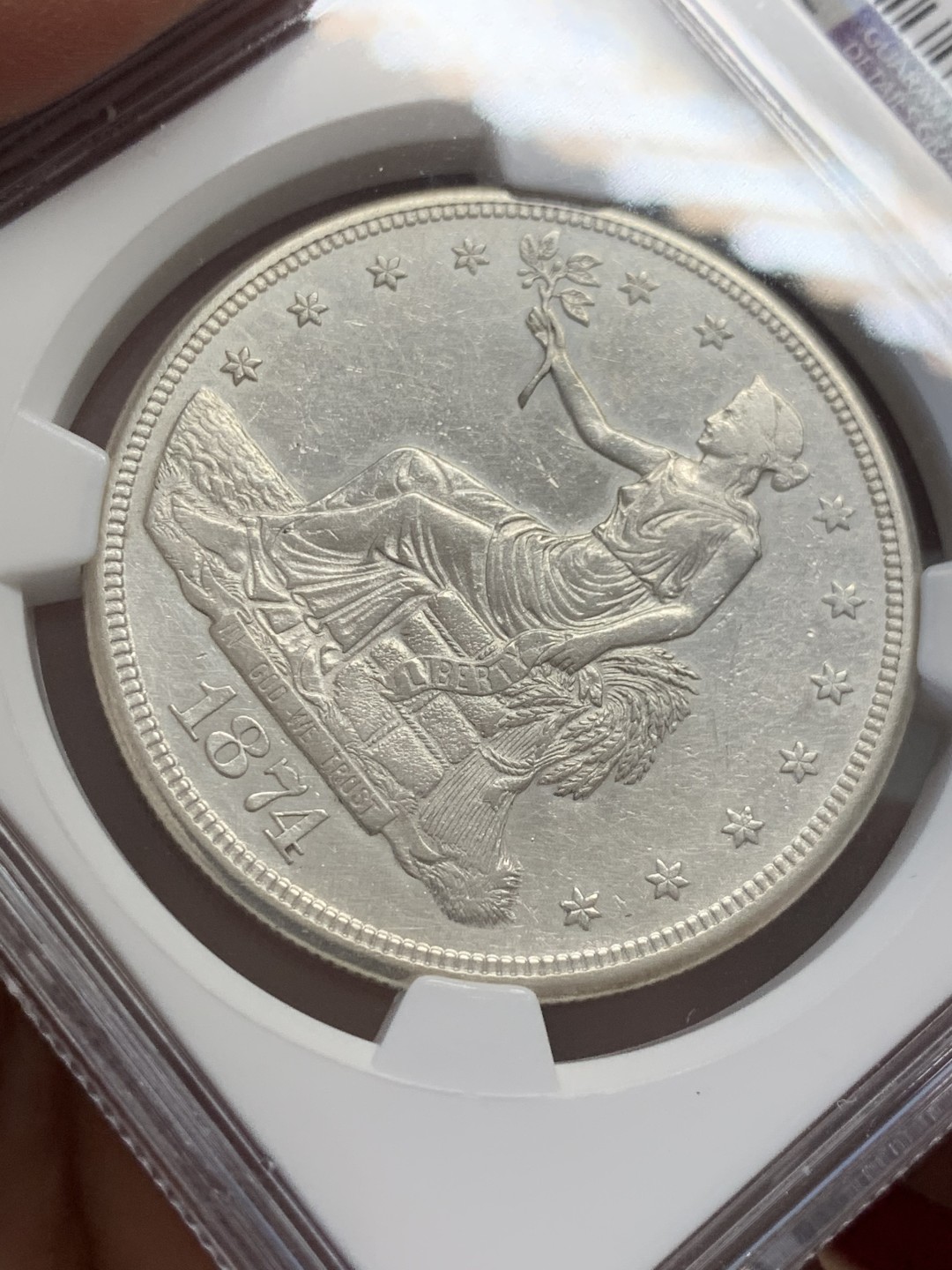 《竞宝斋》第131场-周日，周一连拍 (全场包邮) NGC-AU 美国 1874年 1美元 拿花贸易银 银币 细节保留的不错