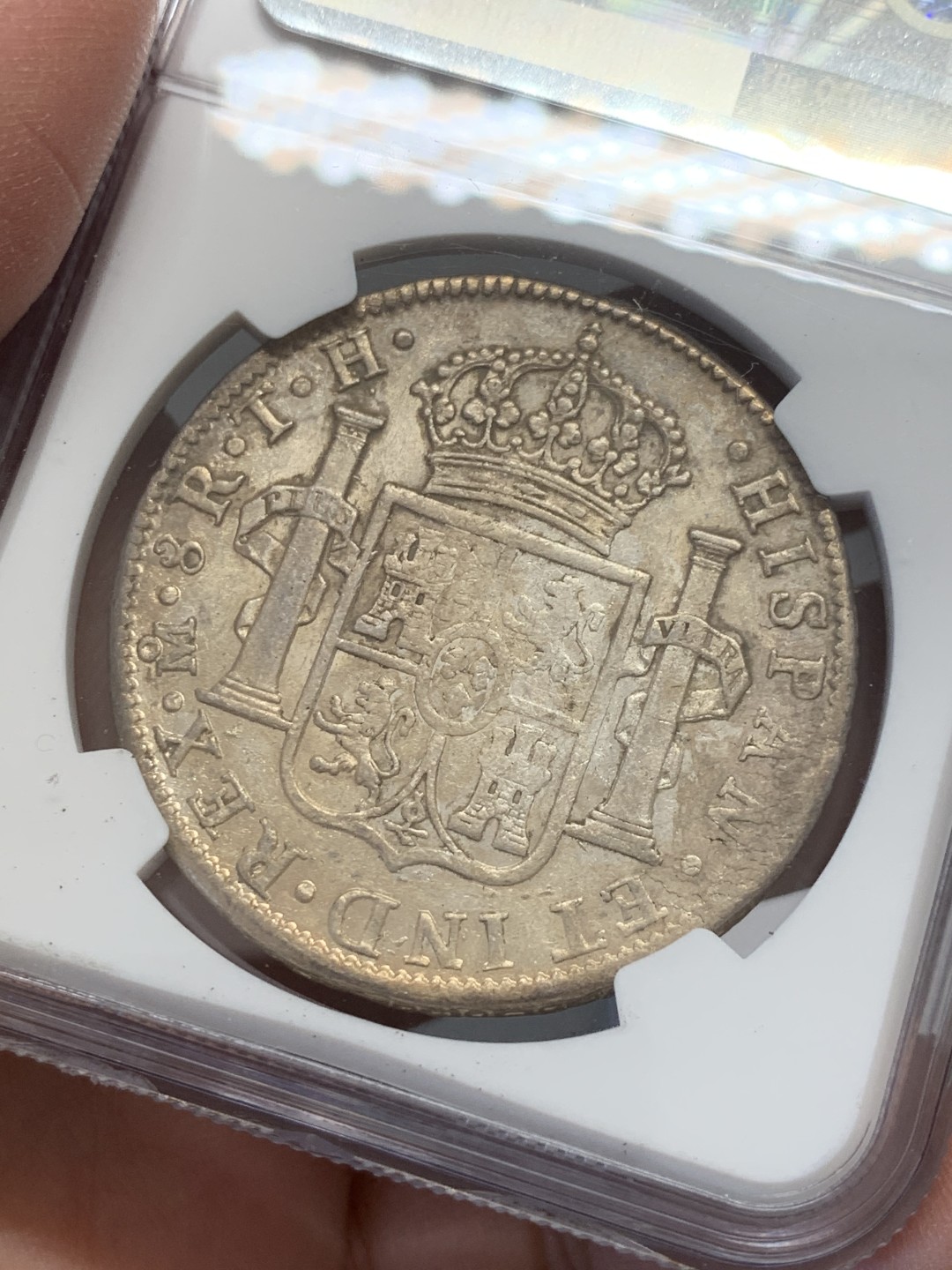 《竞宝斋》第131场-周日，周一连拍 (全场包邮) NGC AU 墨西哥 1805年 卡四 双柱 8R 大银币 打制的还不错 原味状态