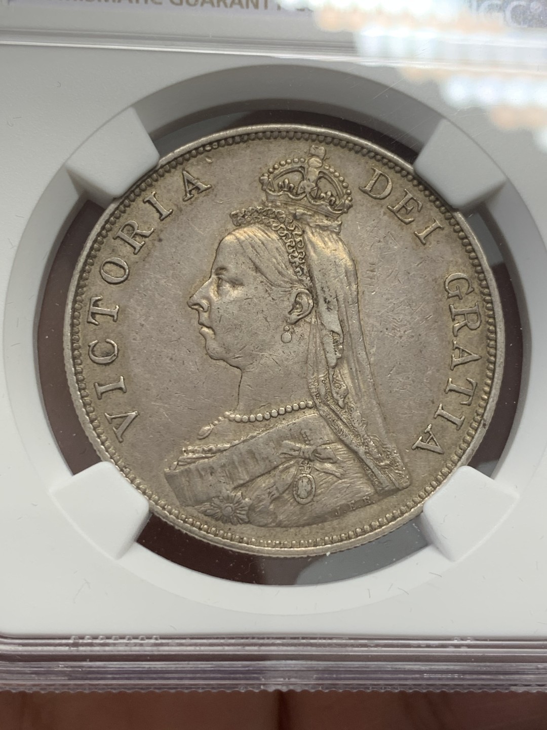 《竞宝斋》第131场-周日，周一连拍 (全场包邮) NGC XF 英国1889年维多利亚高冠双弗洛林大银币