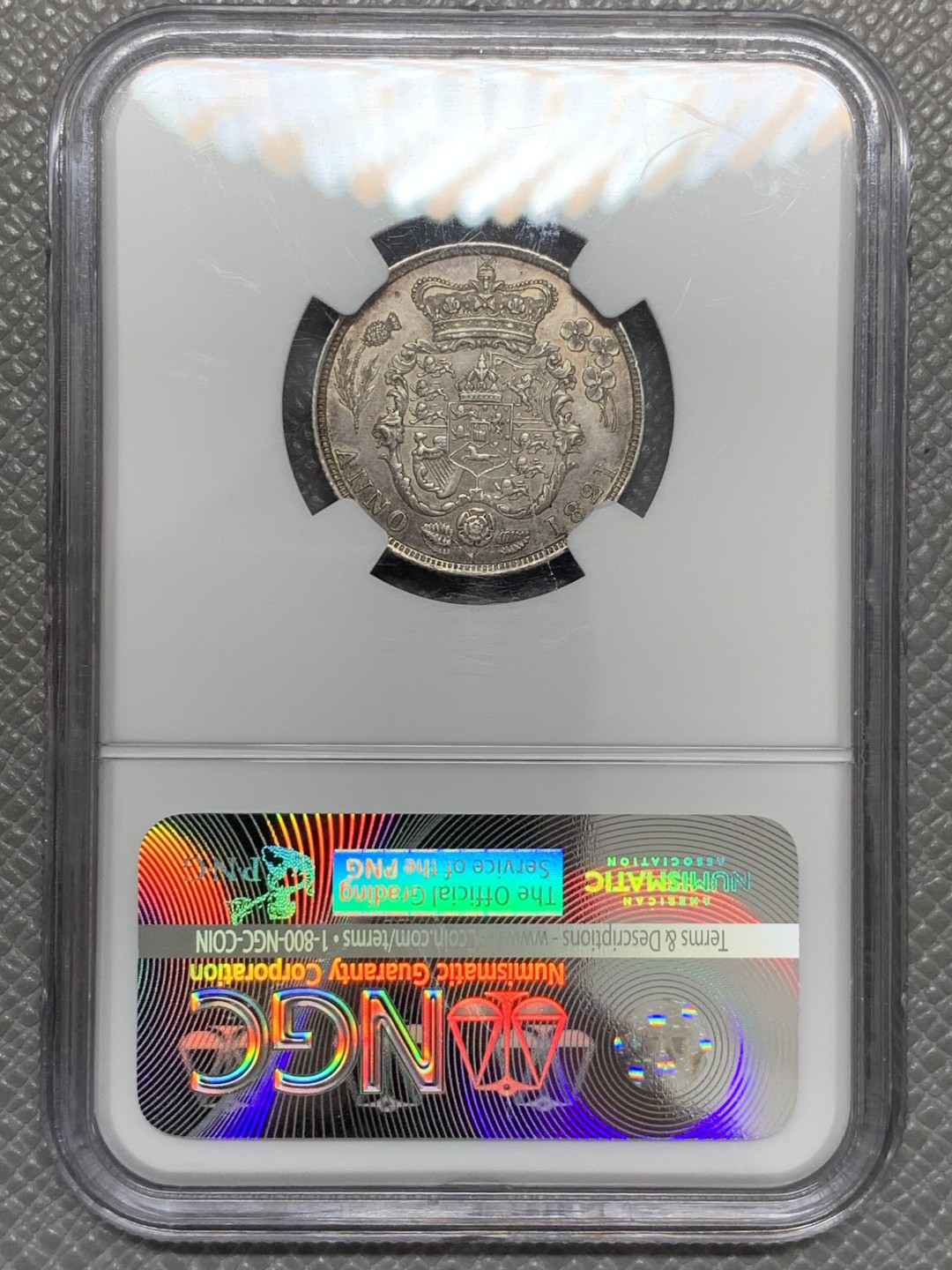 《竞宝斋》第131场-周日，周一连拍 (全场包邮) NGC-AU55 英国 1821年乔治四世三花版1先令银币 著名单年版本，漂亮的三花。实物转光，状态很好，给分略显保守