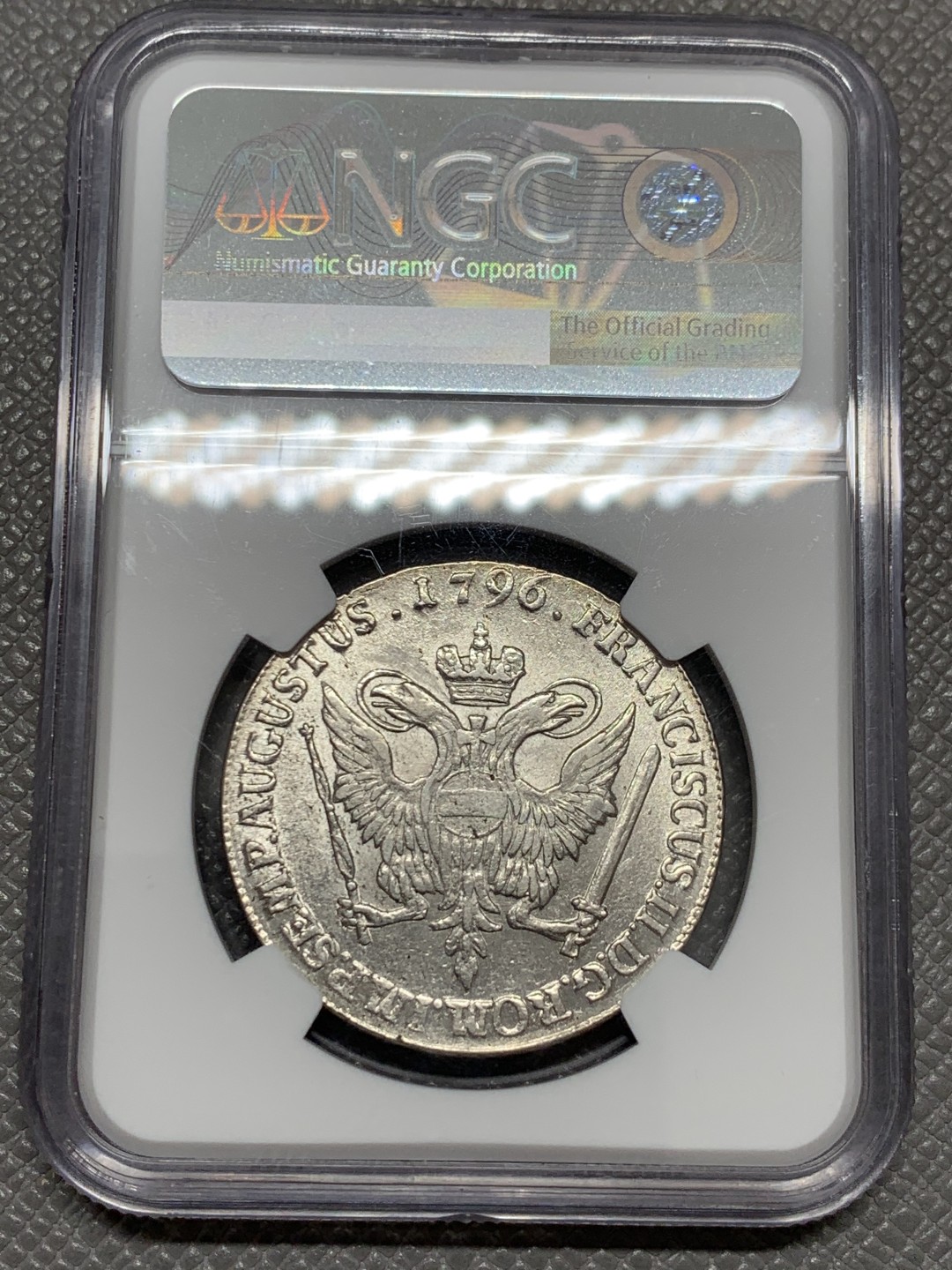 《竞宝斋》第131场-周日，周一连拍 (全场包邮) NGC-MS61 德国汉堡帝国自由市 1796年 32先令 早期双头鹰徽章 收藏级好状态