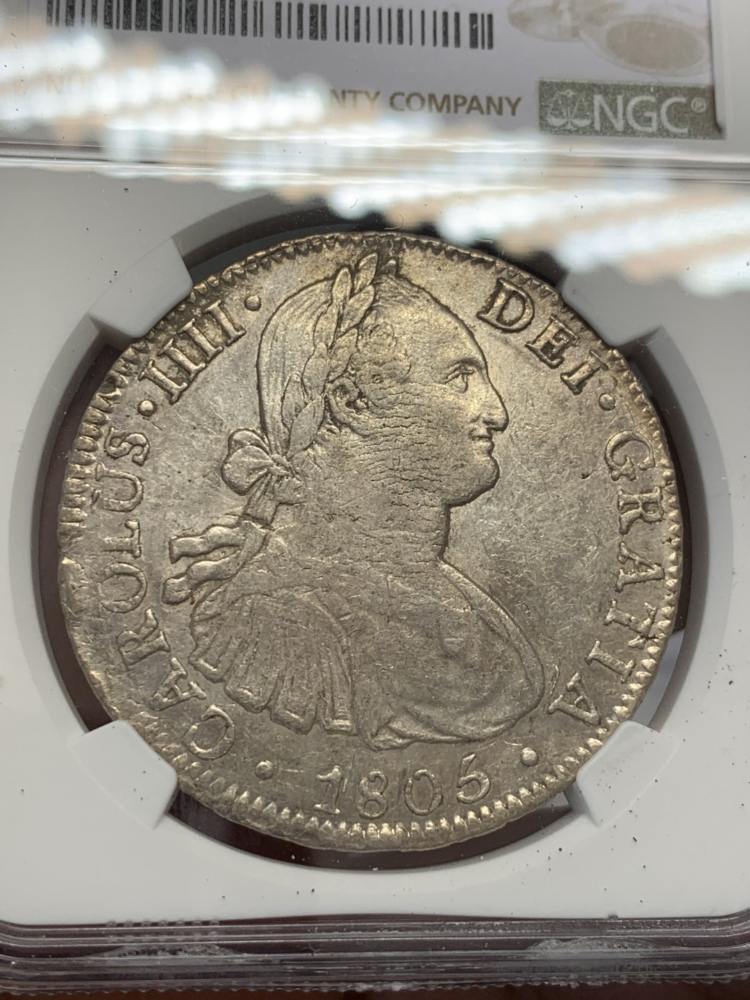 《竞宝斋》第131场-周日，周一连拍 (全场包邮) NGC AU 墨西哥 1805年 卡四 双柱 8R 大银币 打制的还不错 原味状态