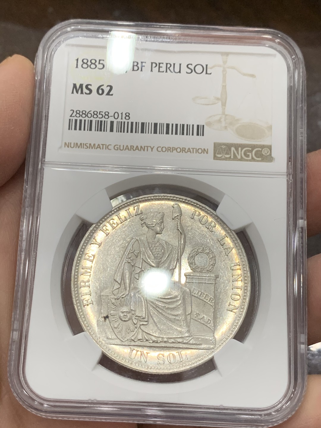 《竞宝斋》第131场-周日，周一连拍 (全场包邮) NGC-MS62 秘鲁 1885年 1索尔 银币 热门中南美 镜面底板 厂别骑字