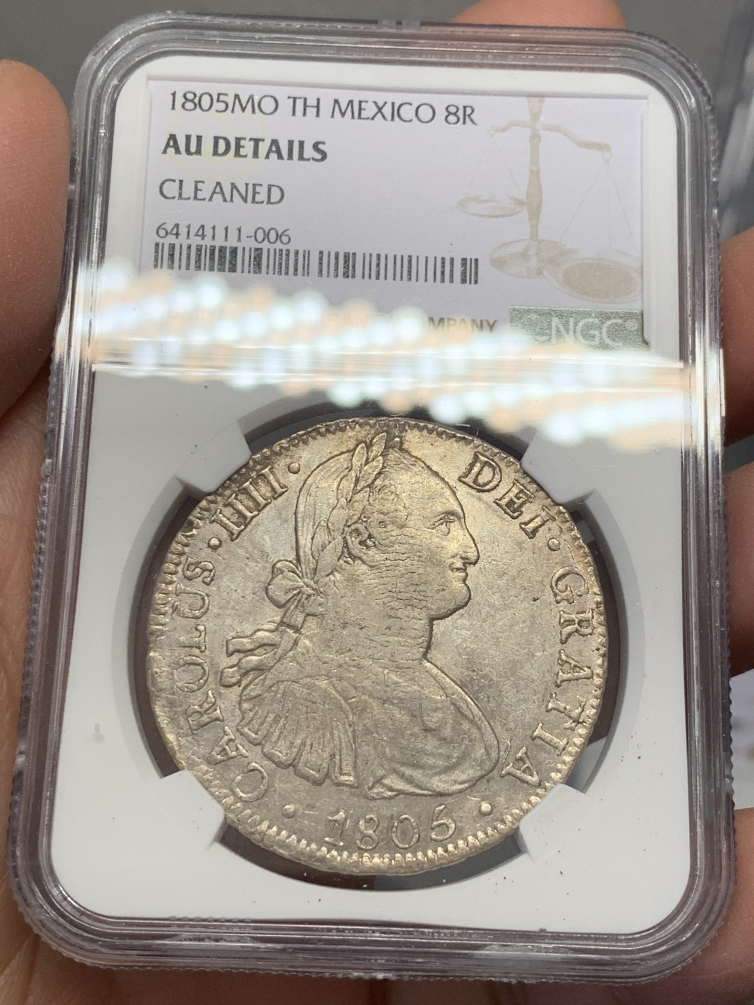《竞宝斋》第131场-周日，周一连拍 (全场包邮) NGC AU 墨西哥 1805年 卡四 双柱 8R 大银币 打制的还不错 原味状态