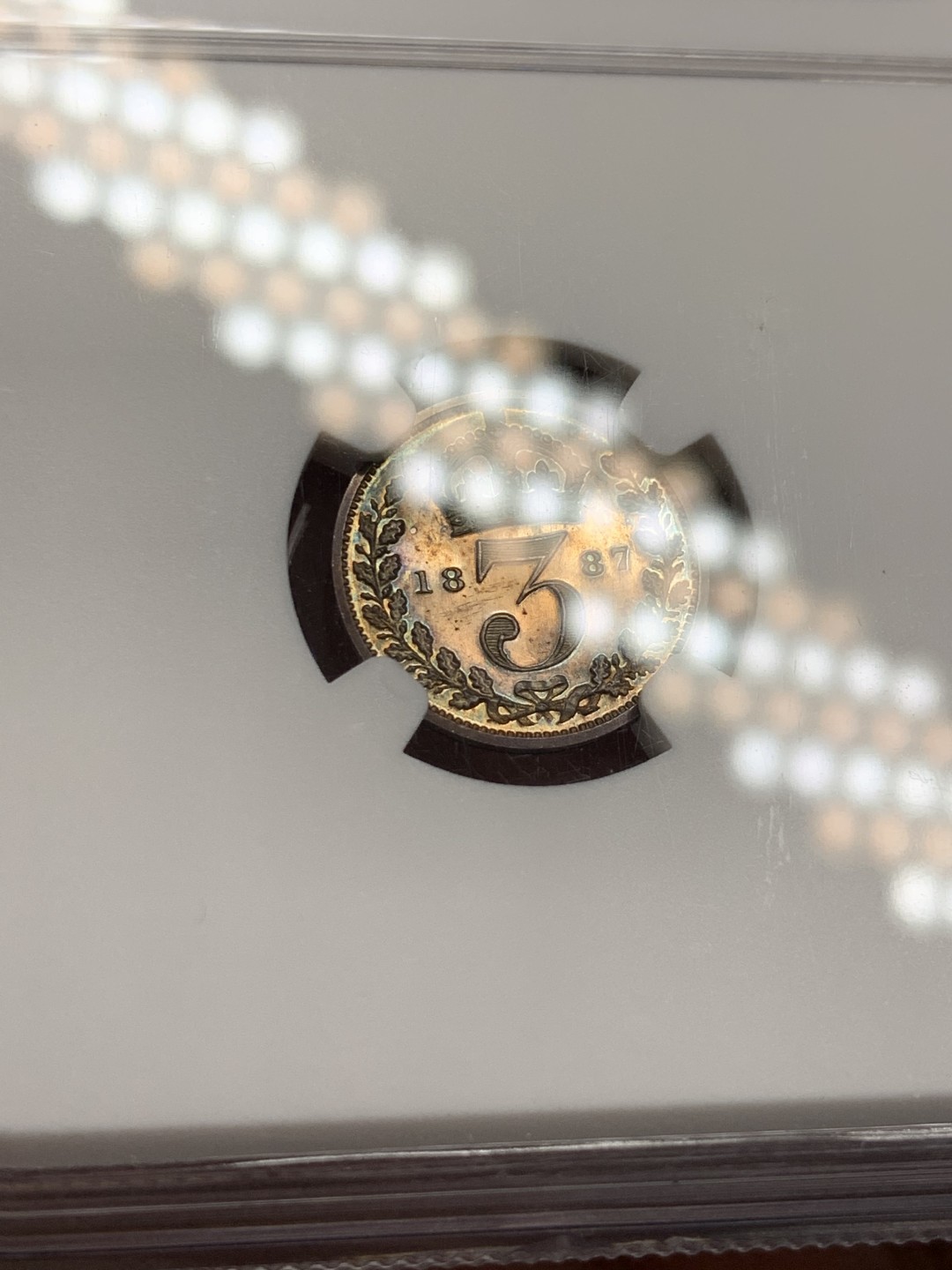 《竞宝斋》第131场-周日，周一连拍 (全场包邮) NGC PF64 英国1887年维多利亚高冠精制3便士银币五彩镜面