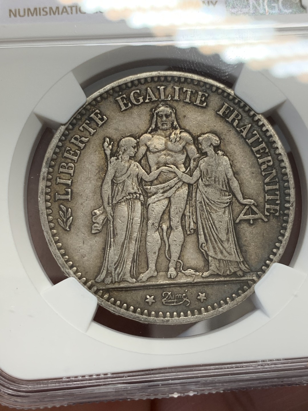 《竞宝斋》第131场-周日，周一连拍 (全场包邮) NGC-AU53 法国 1875年小a版 大力神 5法郎 银币 数量比1873年少太多