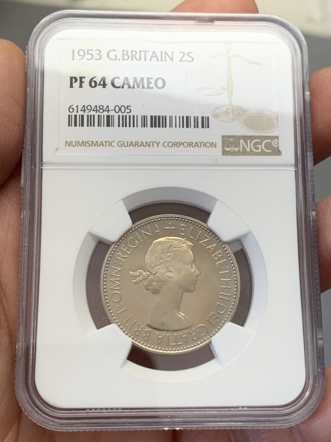 《竞宝斋》第131场-周日，周一连拍 (全场包邮) NGC PF64CA  1953年英国伊丽莎白二世首年精制弗洛林（2先令），原装淡彩带CAM