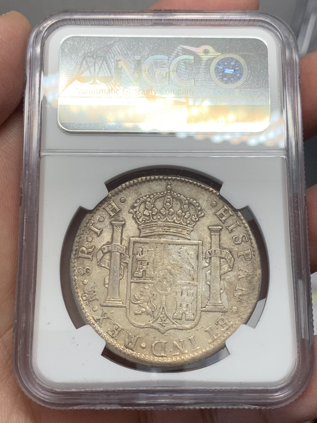 《竞宝斋》第131场-周日，周一连拍 (全场包邮) NGC AU 墨西哥 1805年 卡四 双柱 8R 大银币 打制的还不错 原味状态