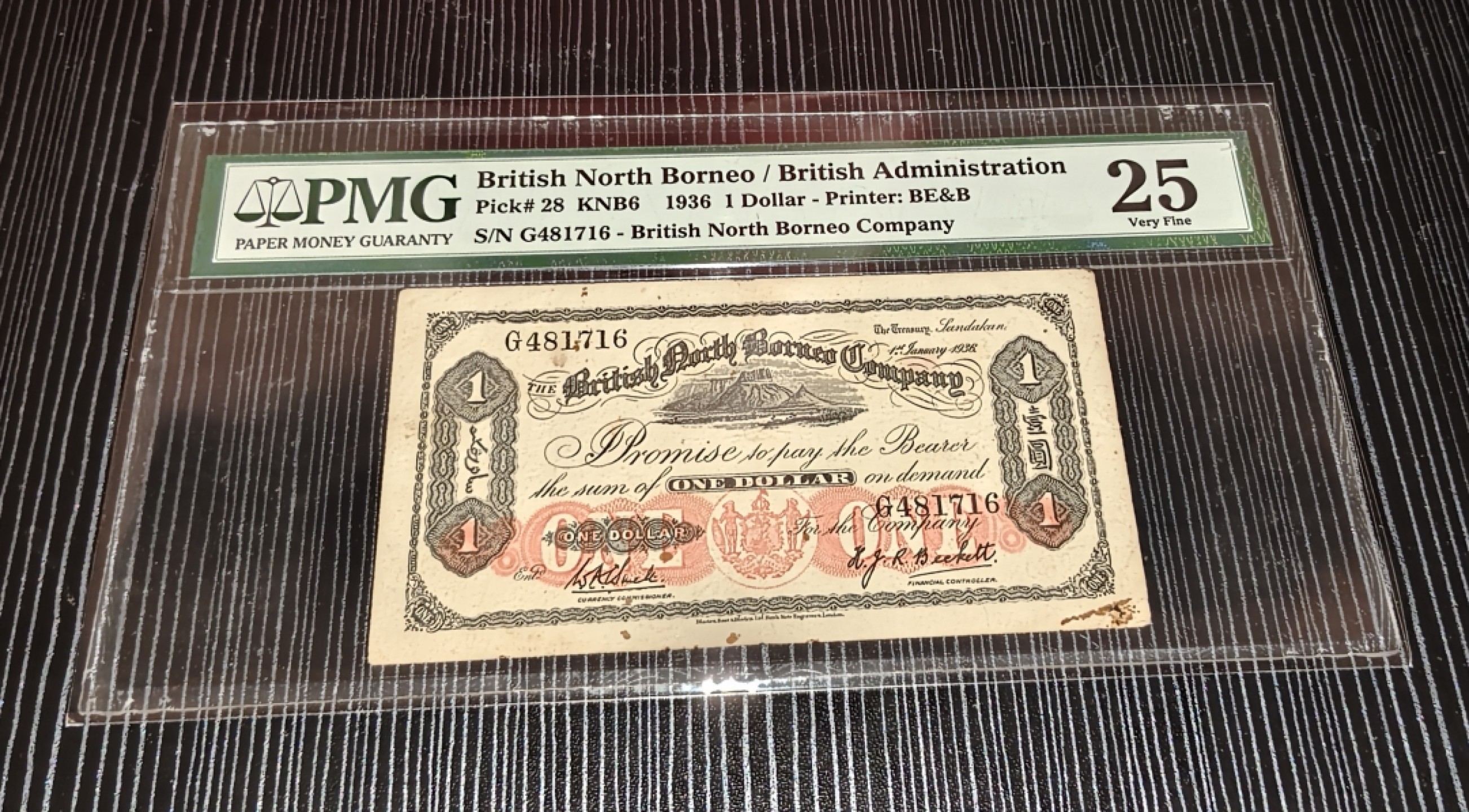 Chase Auction 第16期 - - 外钞、民国钞和一版人民币混合场！ 英属北婆罗洲1936年壹圆，接近90年的老纸币，PMG25分无net，英属北婆罗洲高分纸币都在马来西亚、新加坡老藏家那里，既有英文又有中文的纸币很少见。