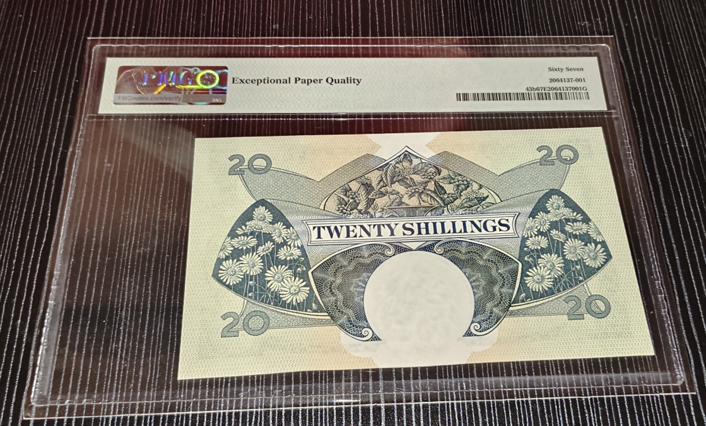 Chase Auction 第16期 - - 外钞、民国钞和一版人民币混合场！ 英属东非1962-1963年20先令（等同于1镑），大冠女王精品之一，PMG67分冠军分，冠军分仅四张
