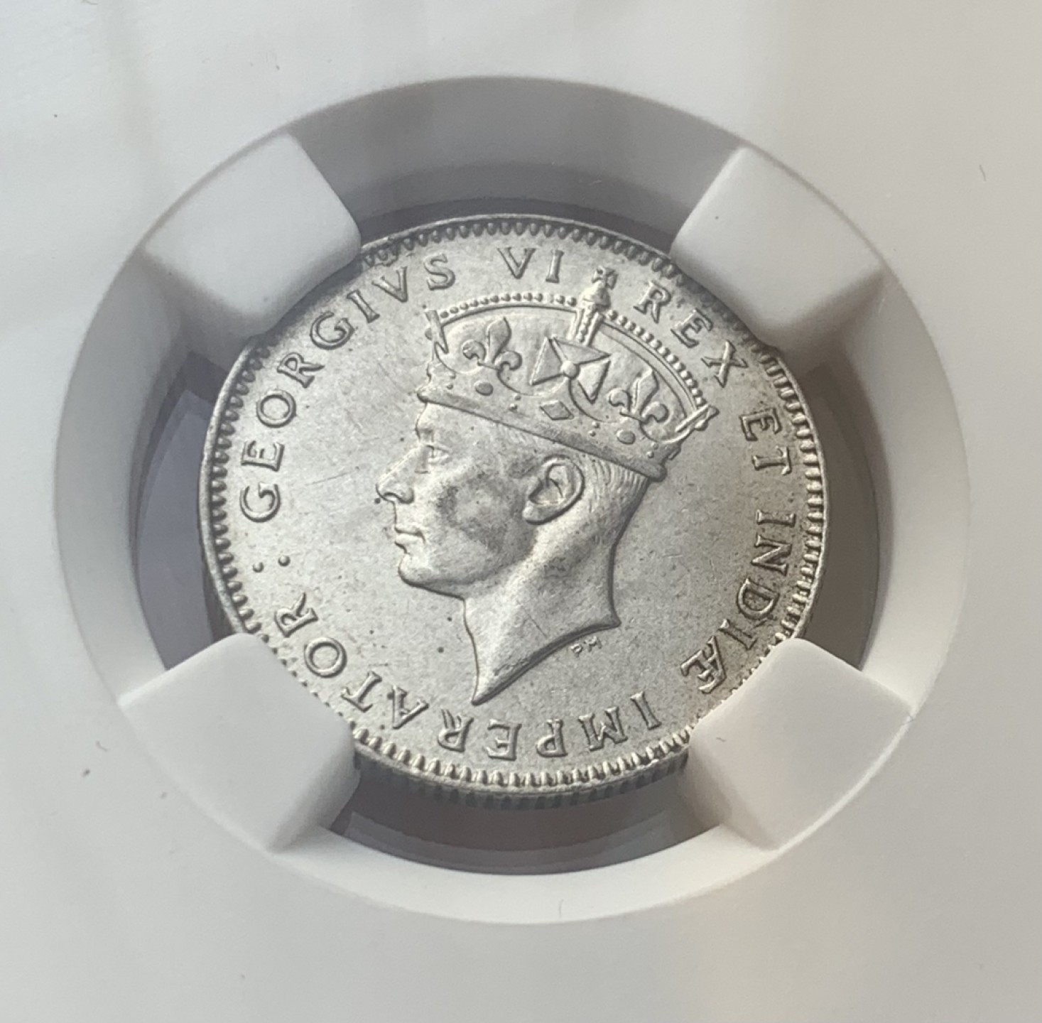 瓶子🏺第77期拍卖会 东非1942年乔六50分银币带光