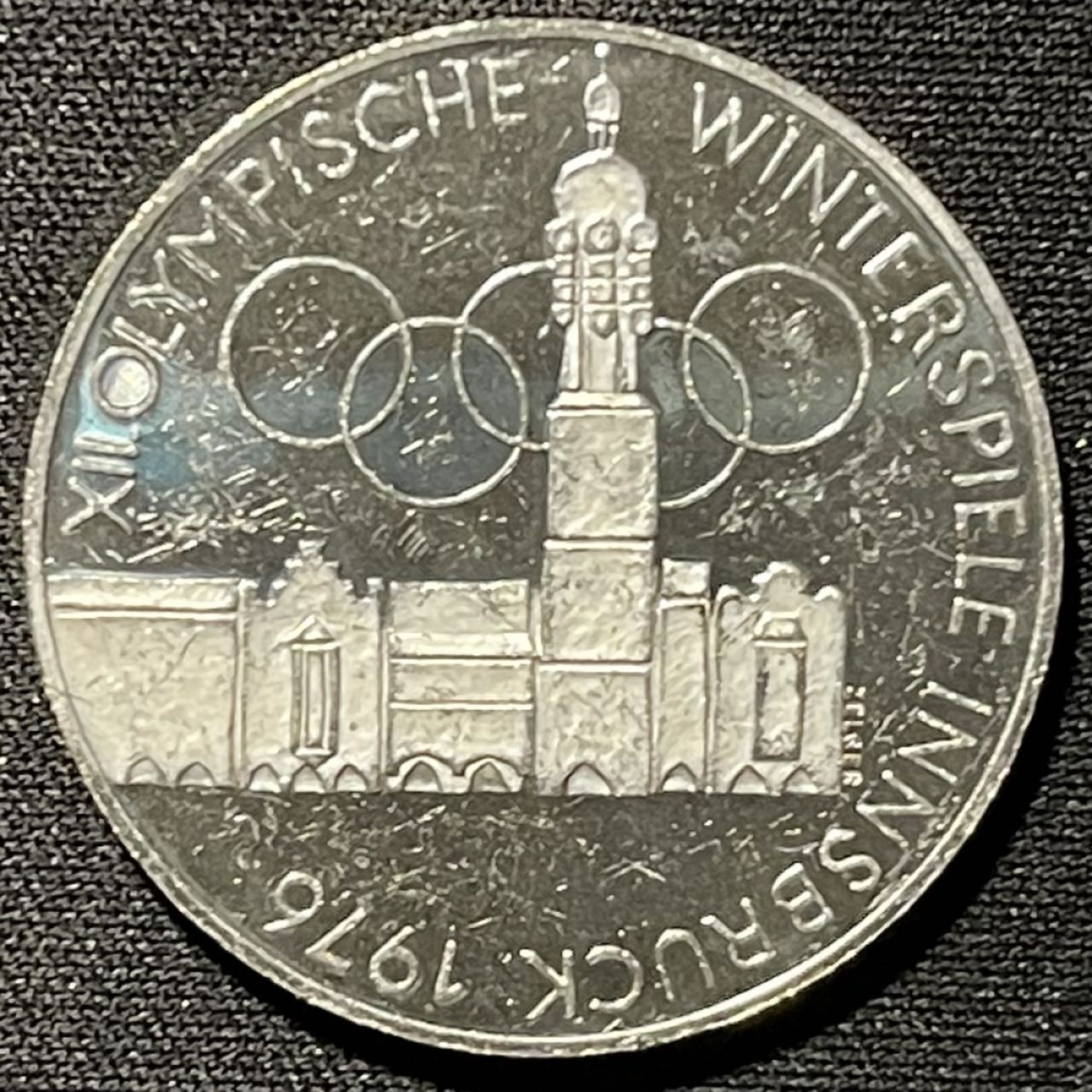 紫瑗钱币——第251期拍卖 奥地利 1976年 因斯布鲁克冬奥运 主会场 100先令 24克 0.64银 精制