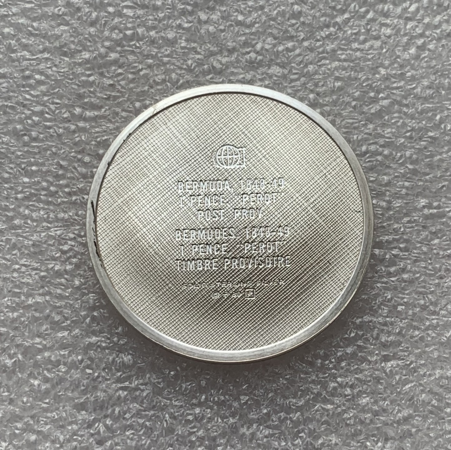 瓶子🏺第77期拍卖会 世界邮政百慕达群岛1848-1849年珍稀银质邮票14.78克32毫米