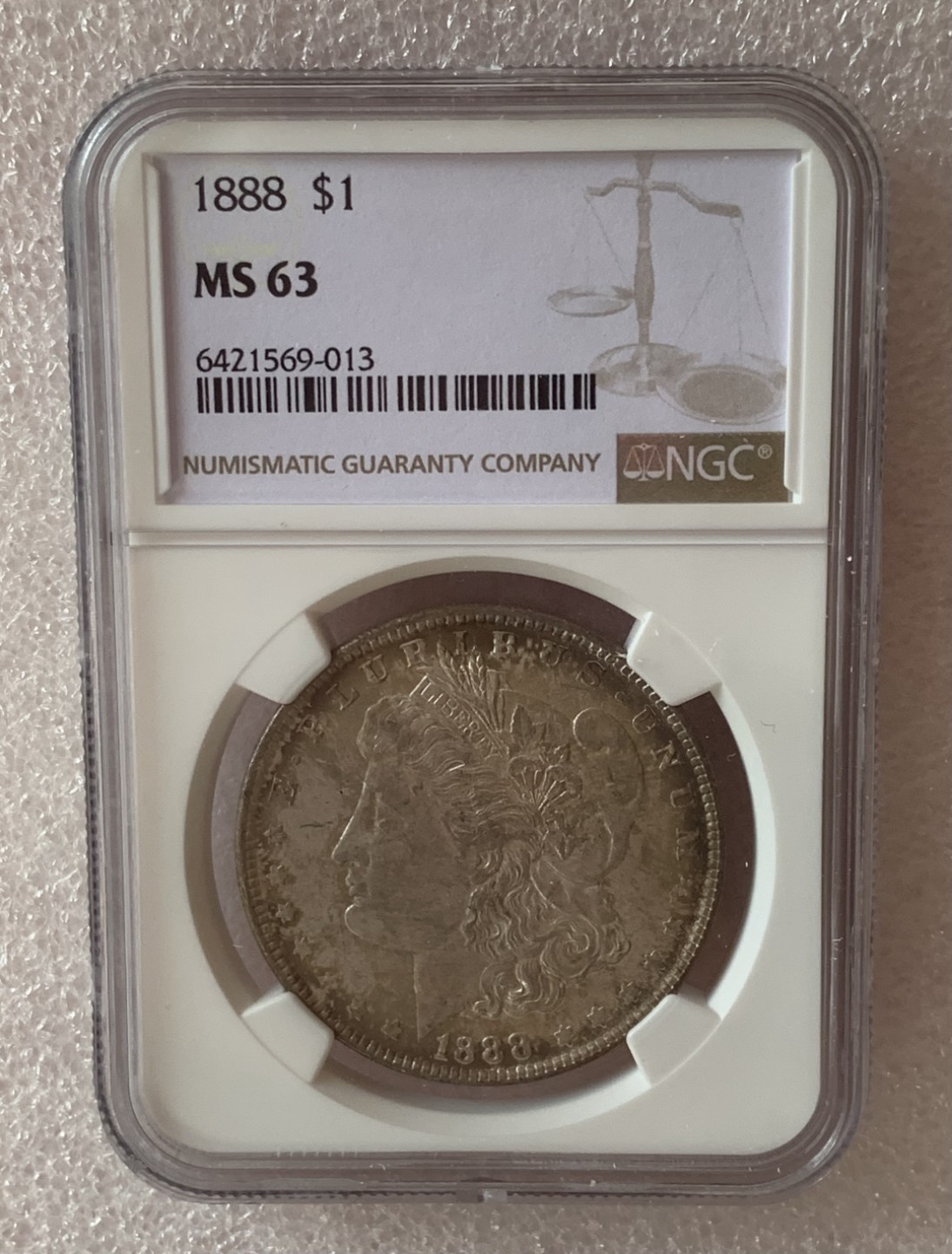 瓶子🏺第77期拍卖会 美国1888年摩根1美元大银币MS63