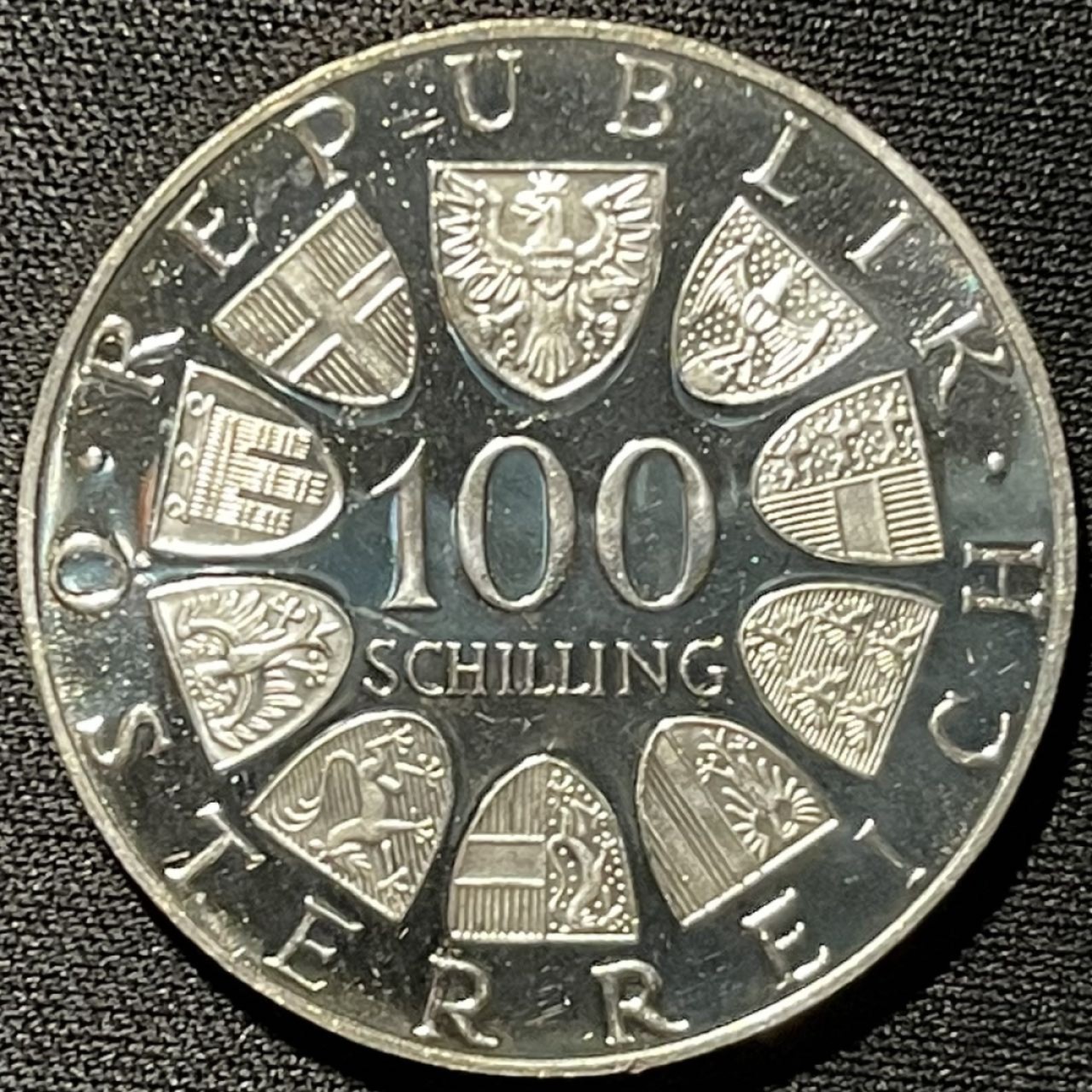 紫瑗钱币——第264期拍卖 奥地利 1976年 因斯布鲁克冬奥运 主会场 100先令 24克 0.64银 精制