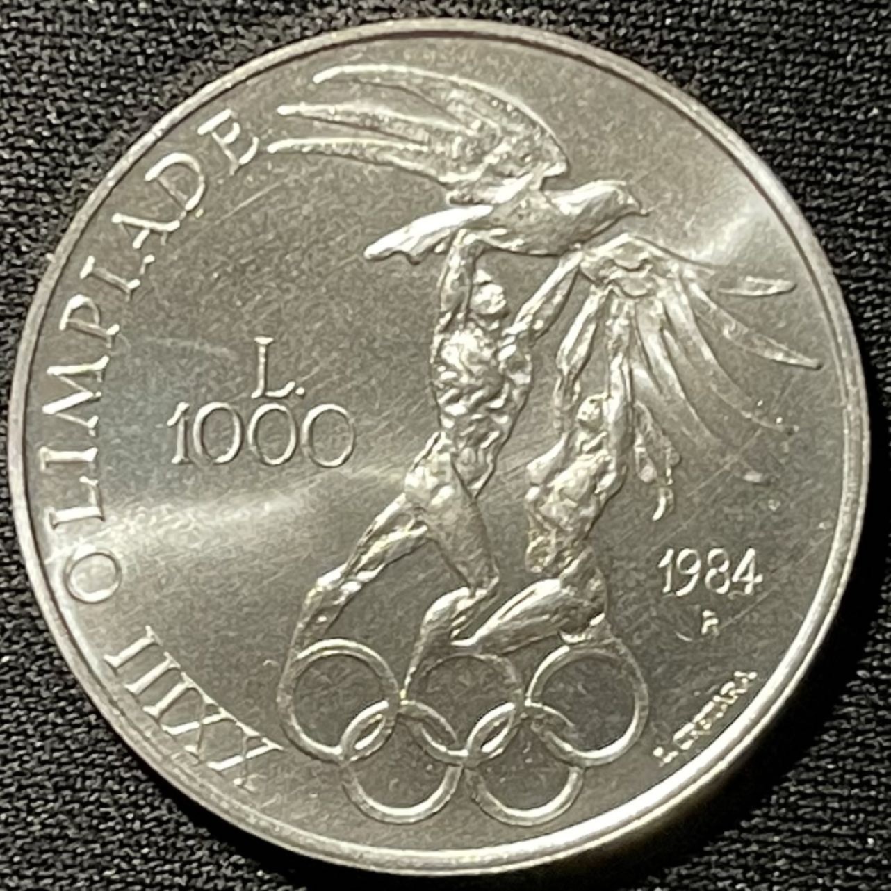 紫瑗钱币——第267期拍卖 圣马力诺 1984年 洛杉矶奥运会 五环 1000里拉 14.6克 0.835银 UNC
