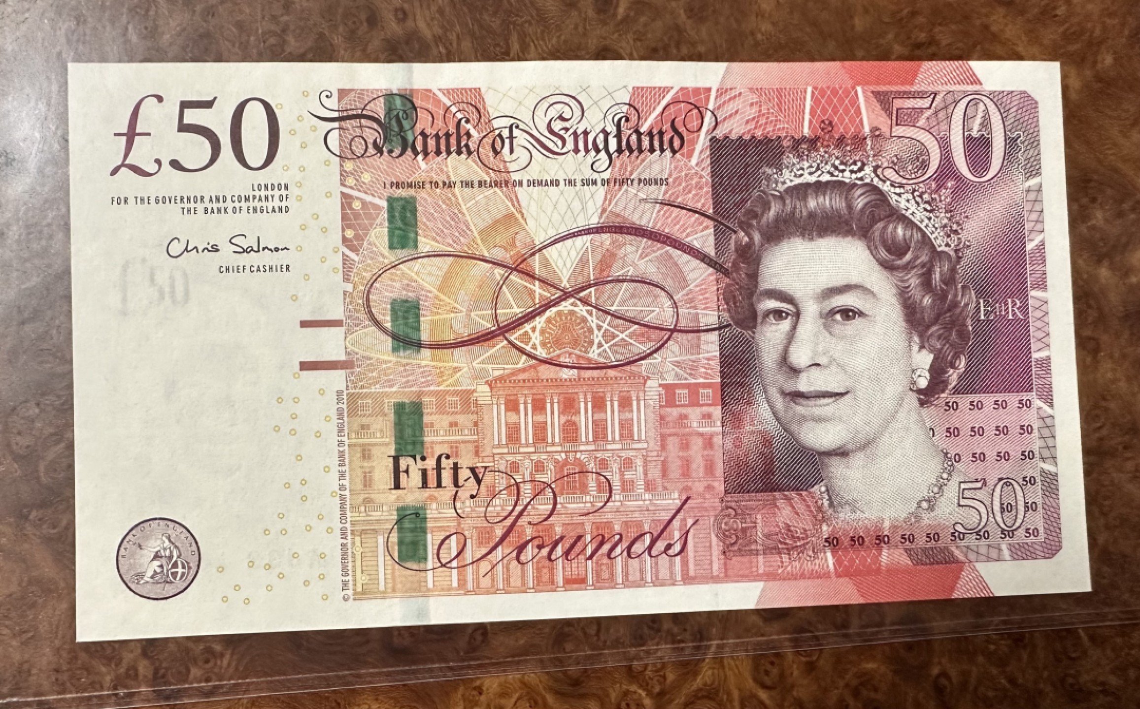 Chase Auction 第16期 - - 外钞、民国钞和一版人民币混合场！ 英国E序列50镑，品相如图！AU—UNC-！
