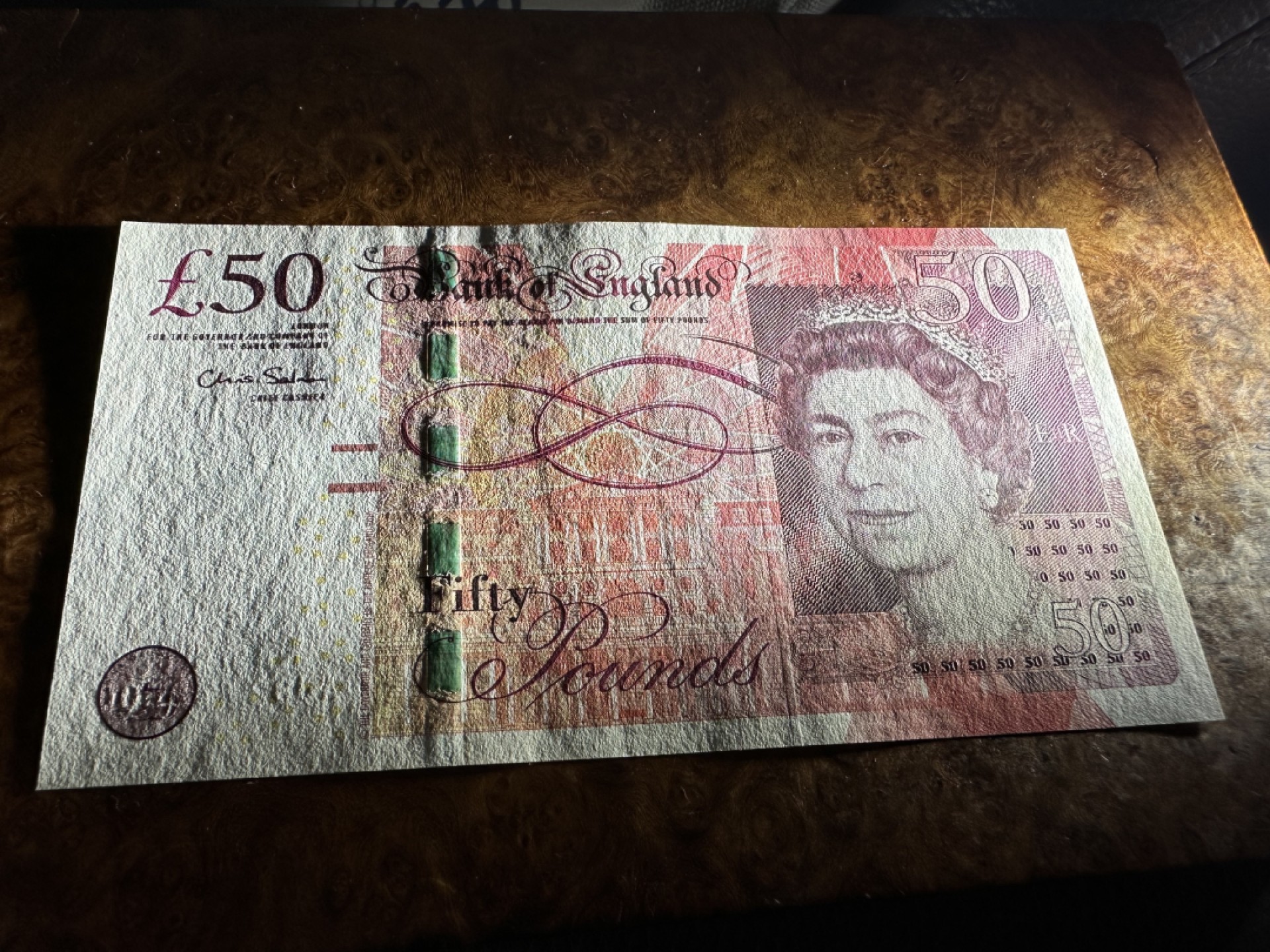 Chase Auction 第16期 - - 外钞、民国钞和一版人民币混合场！ 英国E序列50镑，品相如图！AU—UNC-！