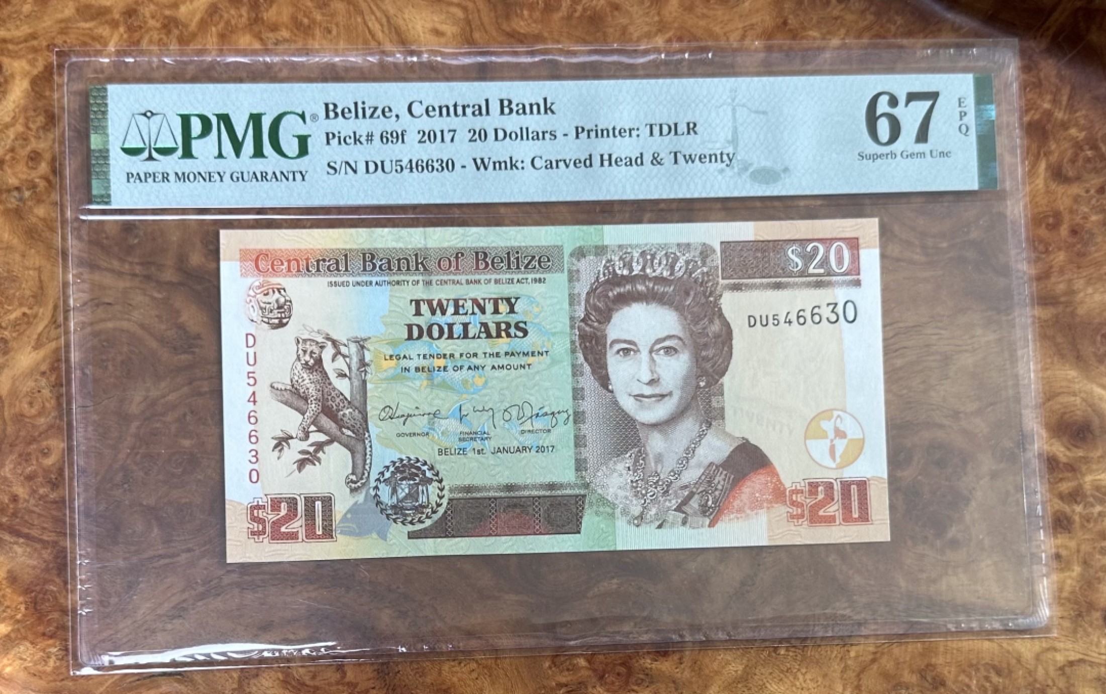 Chase Auction 第16期 - - 外钞、民国钞和一版人民币混合场！ 2017年伯利兹20镑，PMG67分！