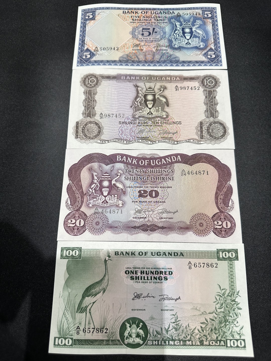 《外钞收藏家》第二百三十七期 乌干达20-100一套4张 全新UNC 100和5面额有轻微潮