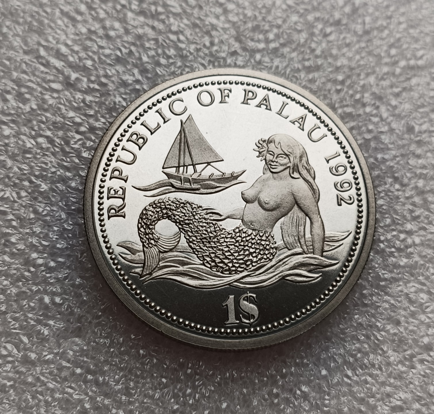 瓶子🏺第78期拍卖会 帕劳1992年首枚美人鱼1元克朗彩色币