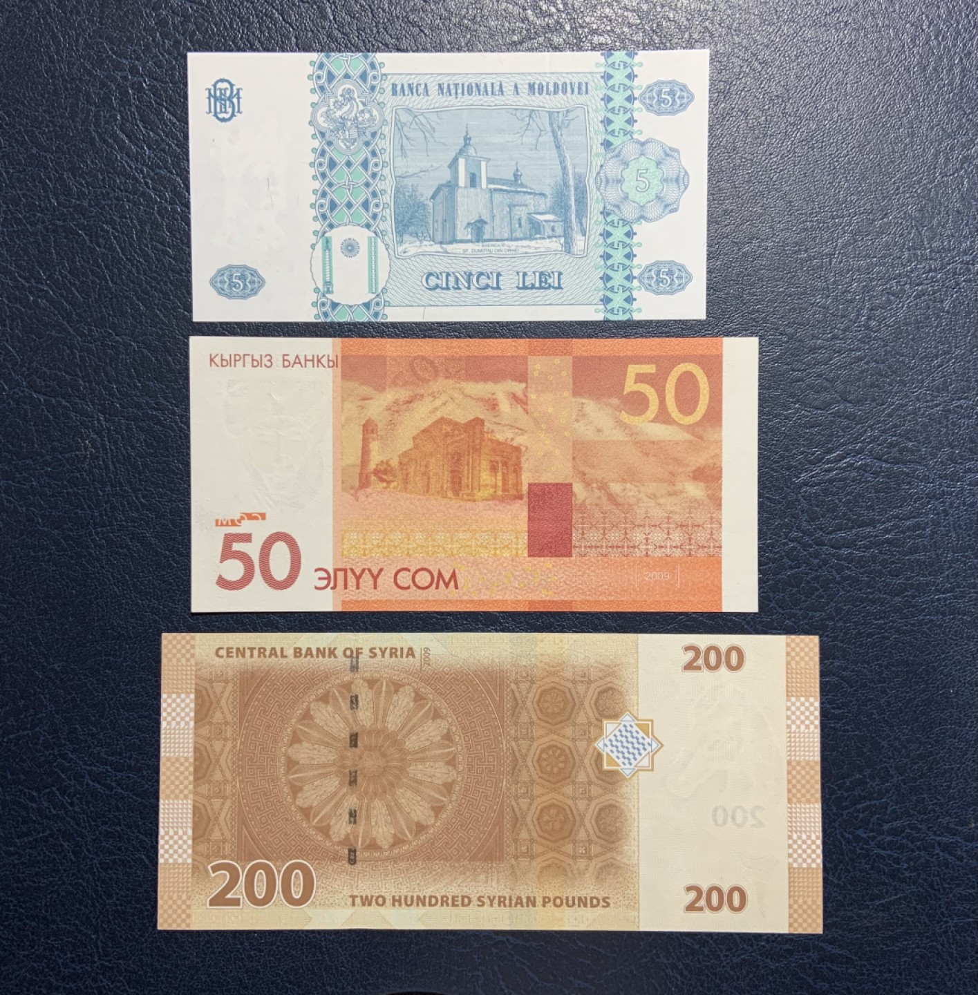 收藏联盟Quantum Auction 第231期拍卖 已更新 摩尔多瓦，吉尔吉斯坦和叙利亚三国豹子号一组 品相全新UNC 吉尔吉斯坦为高山皇后库里曼江-民族独立先驱