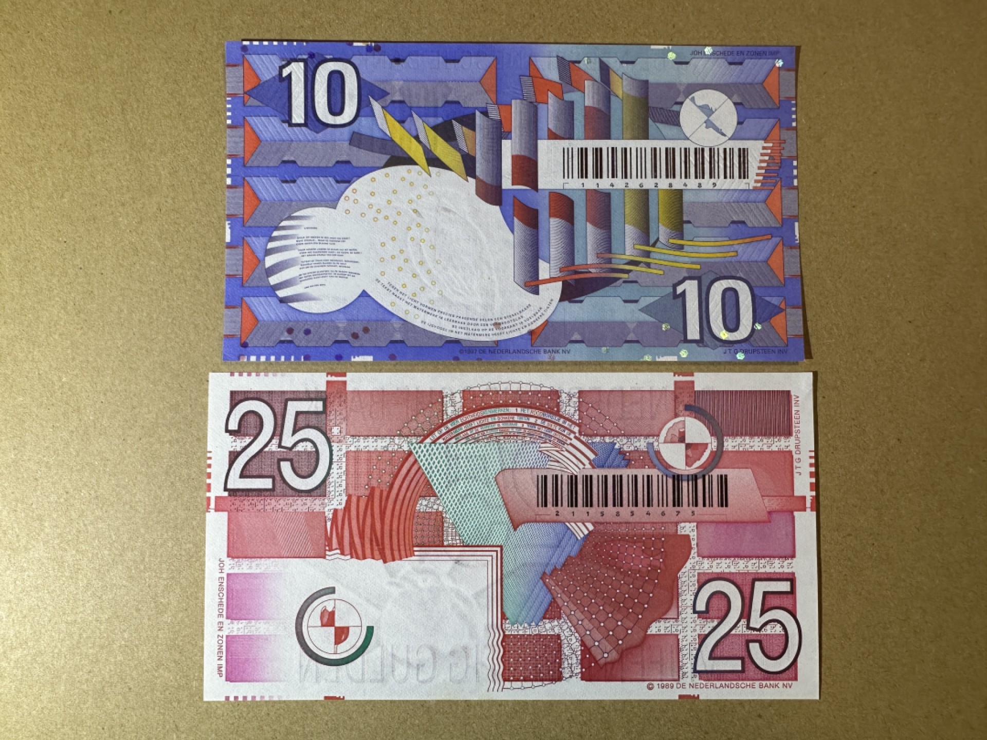 《张总收藏》89期——外币荟萃 欧洲精品 荷兰10、25盾2张 UNC 齿轮版