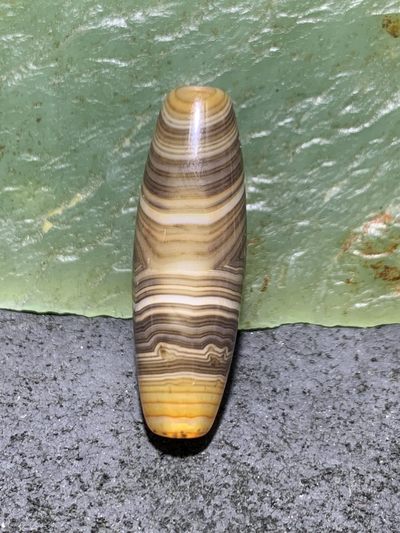 缠丝玛瑙直桶通货桶珠一个 缠丝玛瑙直桶通货桶珠一个