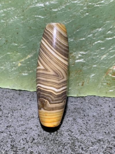 缠丝玛瑙直桶通货桶珠一个 缠丝玛瑙直桶通货桶珠一个