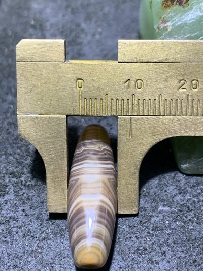 缠丝玛瑙直桶通货桶珠一个 缠丝玛瑙直桶通货桶珠一个