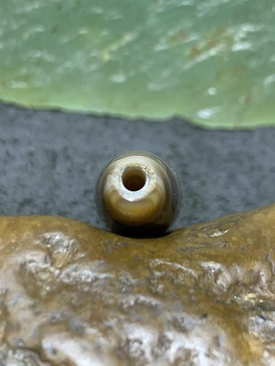 缠丝玛瑙直桶通货桶珠一个 缠丝玛瑙直桶通货桶珠一个