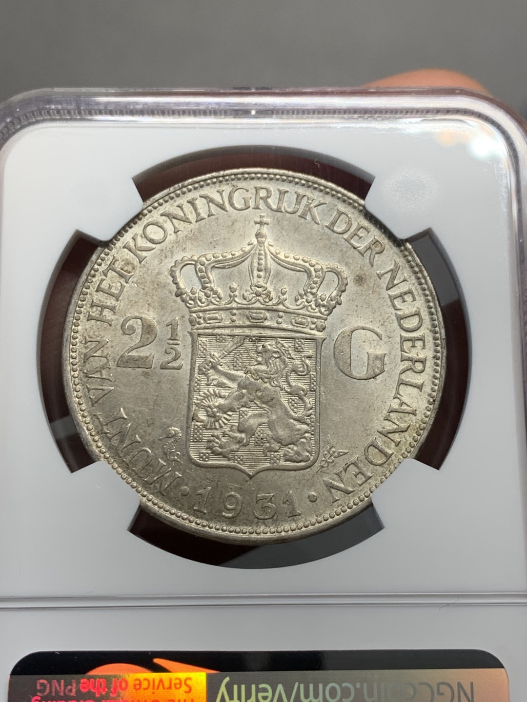 《竞宝斋》第135场-周日，周一连拍 (全场包邮) NGC-MS62 荷兰1931年 威廉米娜女王2.5盾银币 早期年份带彩包浆 非常漂亮
