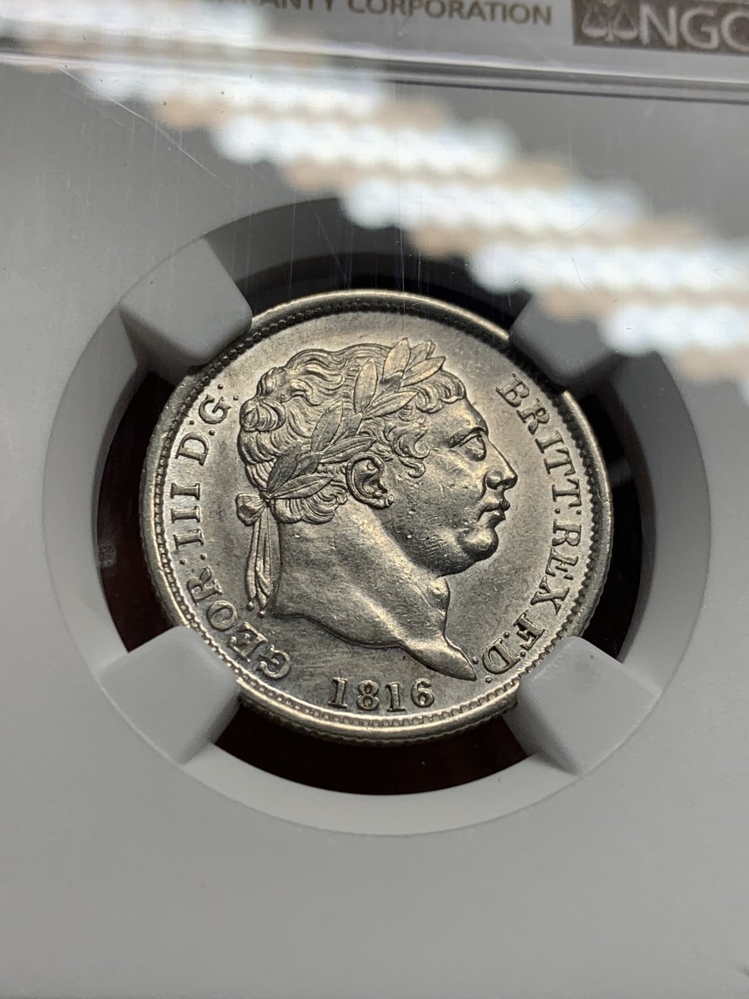 《竞宝斋》第135场-周日，周一连拍 (全场包邮) NGC MS61 英国 1816年 乔三牛头 1先令 银币 上涨品种