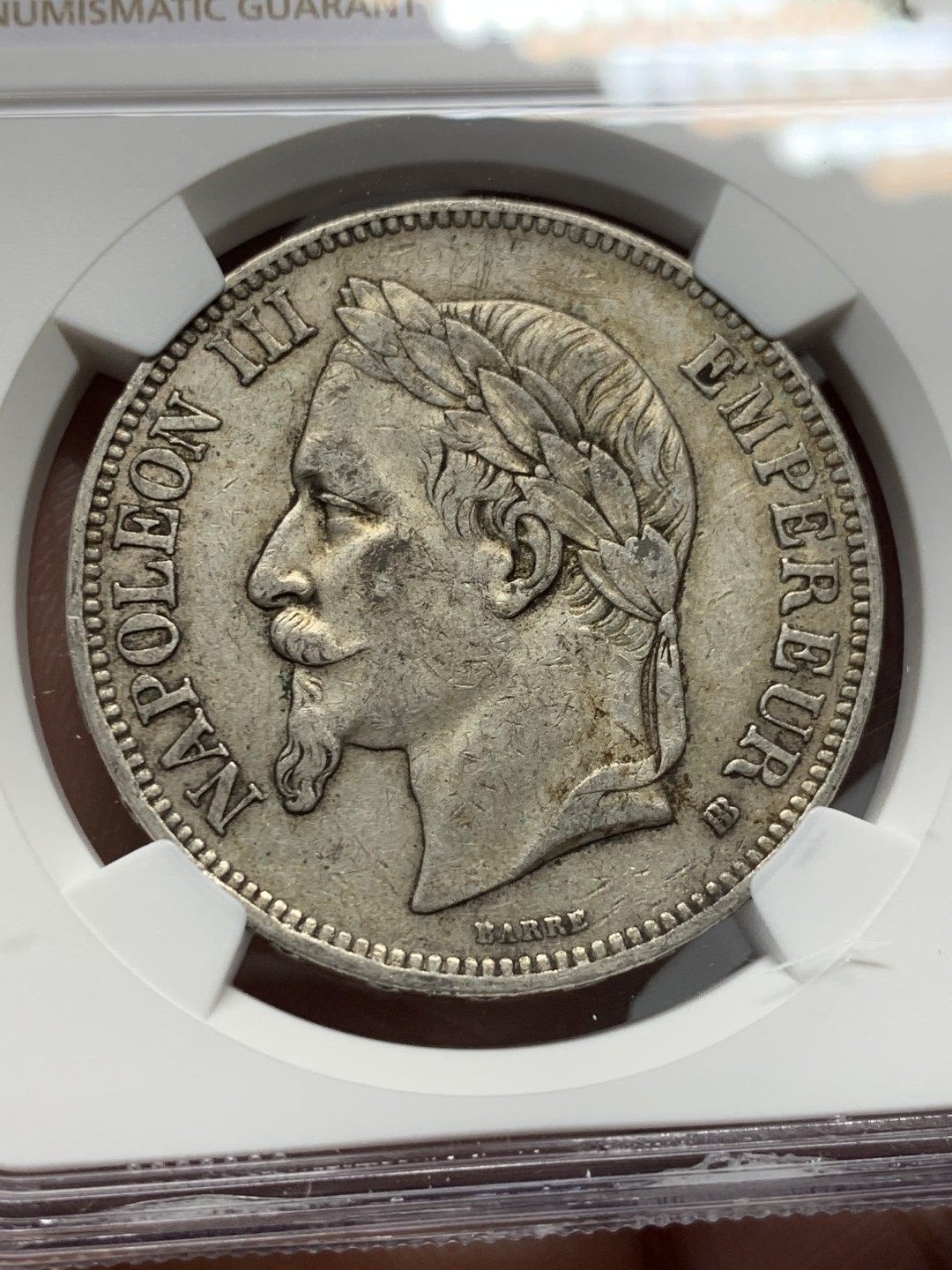 《竞宝斋》第135场-周日，周一连拍 (全场包邮) NGC AU53 法国 1867年 拿三 5法郎银币 原味好细节不多的年份