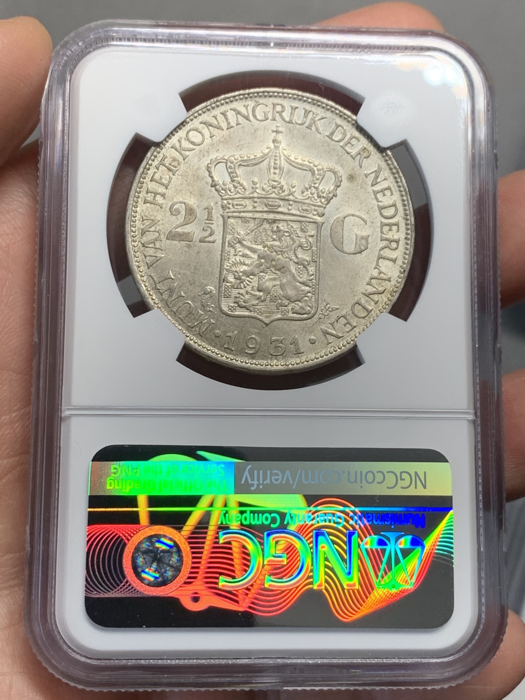 《竞宝斋》第135场-周日，周一连拍 (全场包邮) NGC-MS62 荷兰1931年 威廉米娜女王2.5盾银币 早期年份带彩包浆 非常漂亮