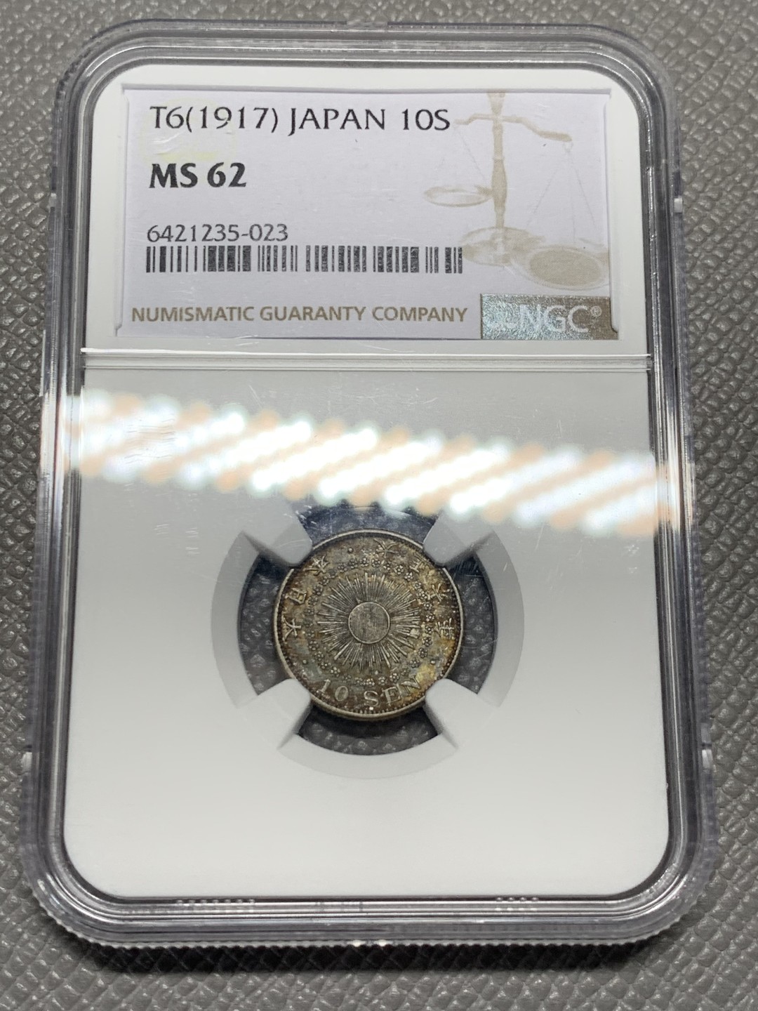 《竞宝斋》第135场-周日，周一连拍 (全场包邮) NGC-MS62 日本 大正六年 (1917) 日本旭日十钱银币，老五彩包浆，正反均匀入骨。银毫常见，好彩难得