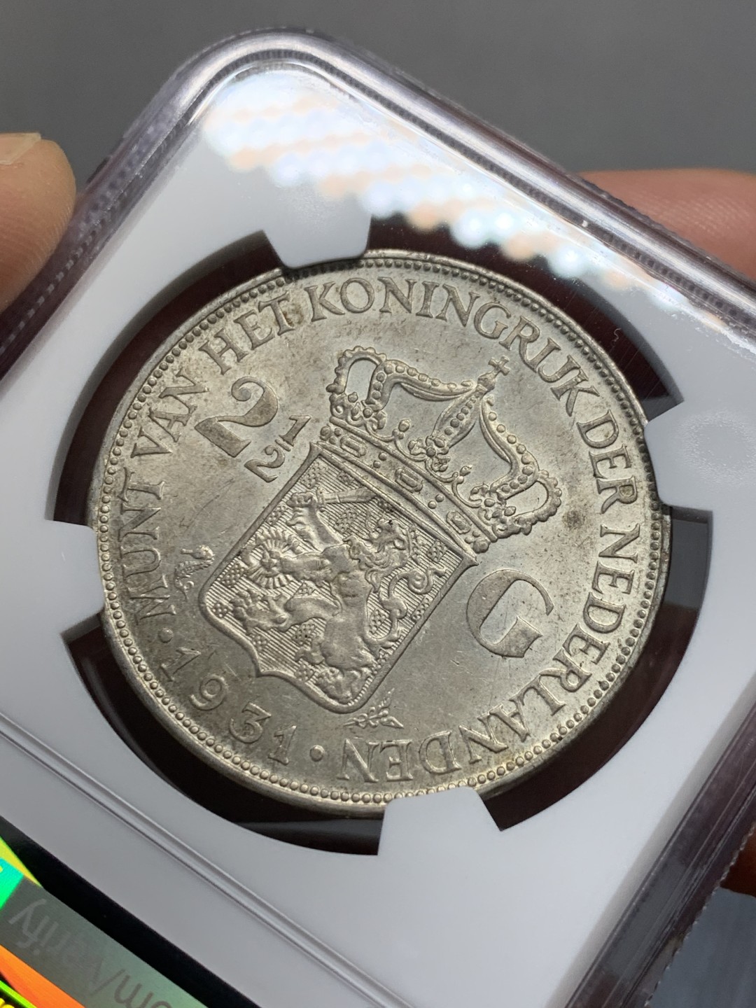 《竞宝斋》第135场-周日，周一连拍 (全场包邮) NGC-MS62 荷兰1931年 威廉米娜女王2.5盾银币 早期年份带彩包浆 非常漂亮