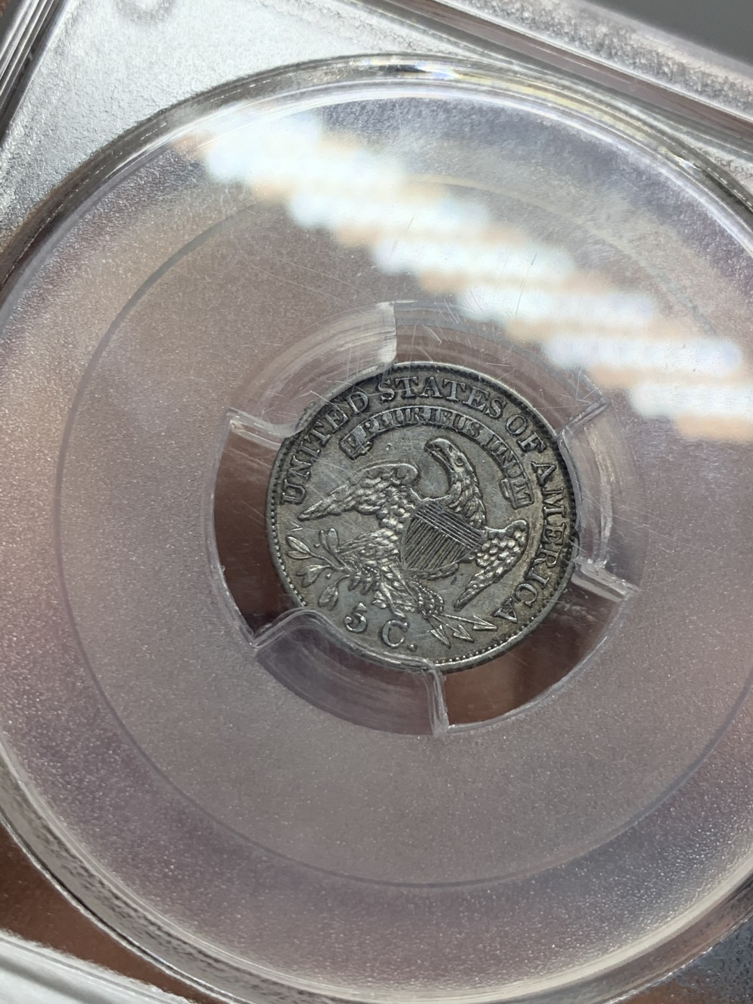 《竞宝斋》第135场-周日，周一连拍 (全场包邮) PCGS AU55 美国 1834年 5分银币 齿边 P厂 美早期少而精 精而贵品种 发行量仅148万 PC往上仅9枚 美系币中罕见咯 该枚PC指导价3177元 58分2002年Goldberg Auctioneers成交价8849元 64分HA2017年80000元