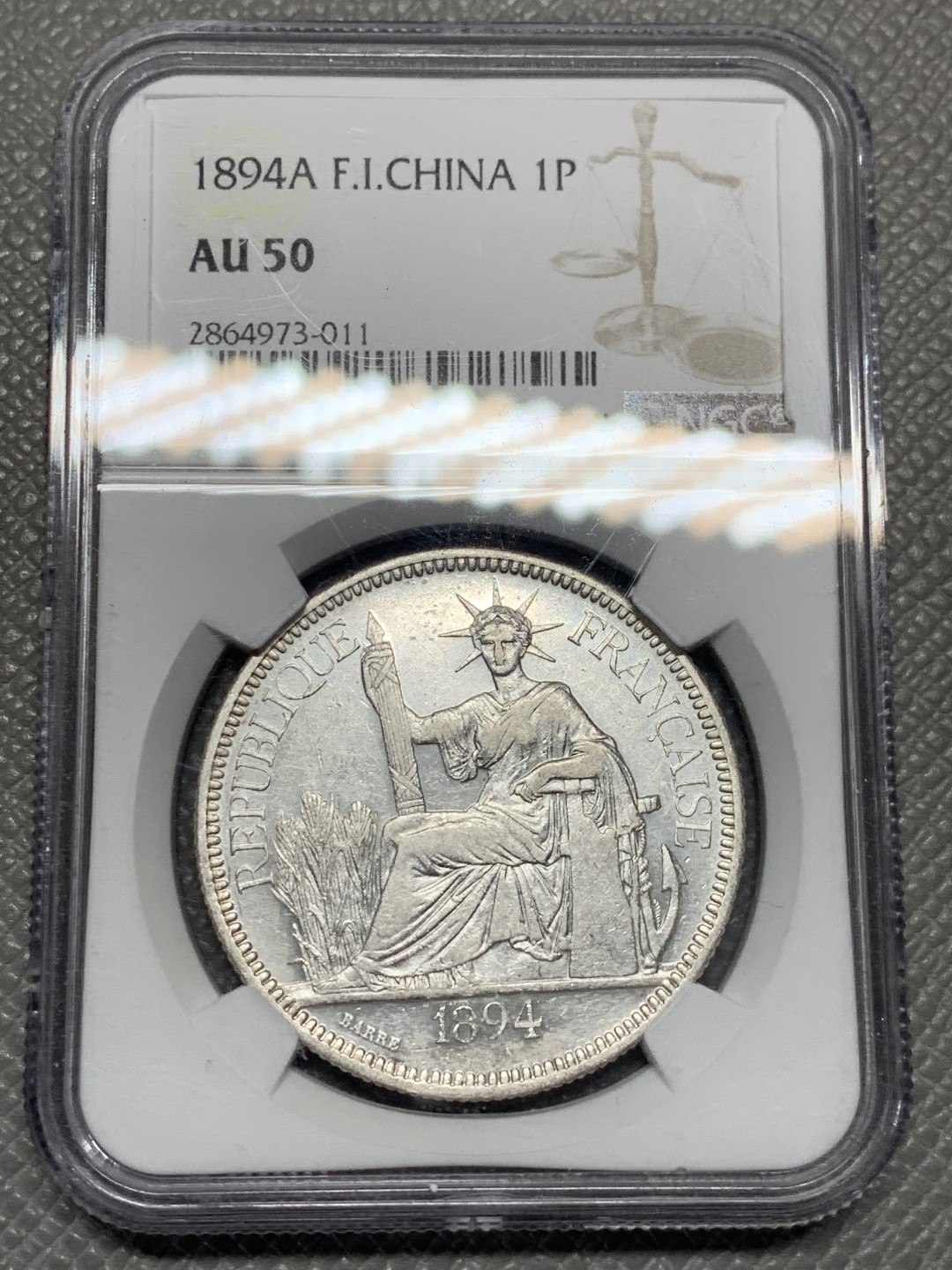 《竞宝斋》第135场-周日，周一连拍 (全场包邮) NGC-AU50 1894年法属印支加重坐洋 评级数量跟1885和1888相当，远少于1886、1887、1895，加重坐洋有分不易