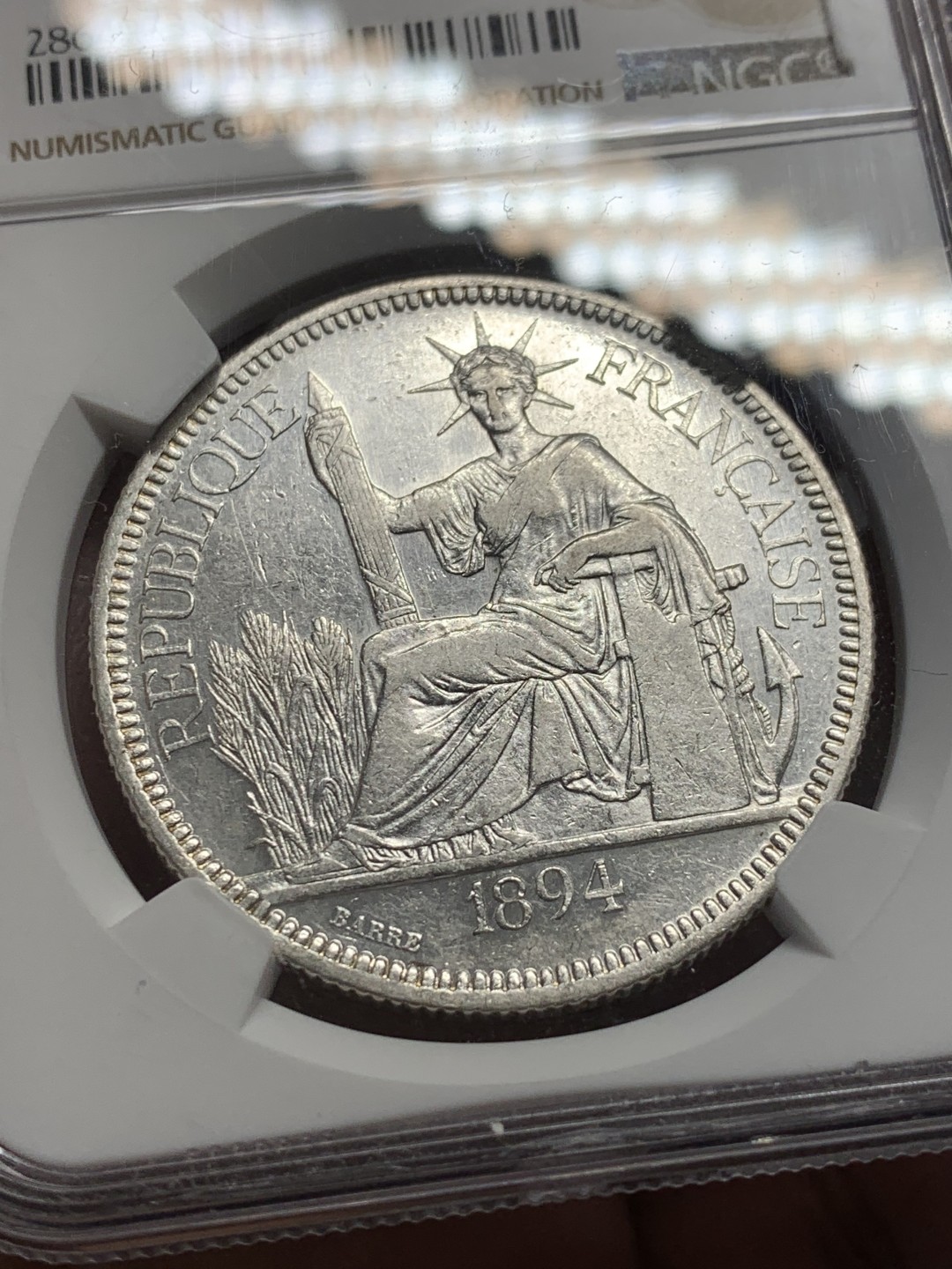 《竞宝斋》第135场-周日，周一连拍 (全场包邮) NGC-AU50 1894年法属印支加重坐洋 评级数量跟1885和1888相当，远少于1886、1887、1895，加重坐洋有分不易