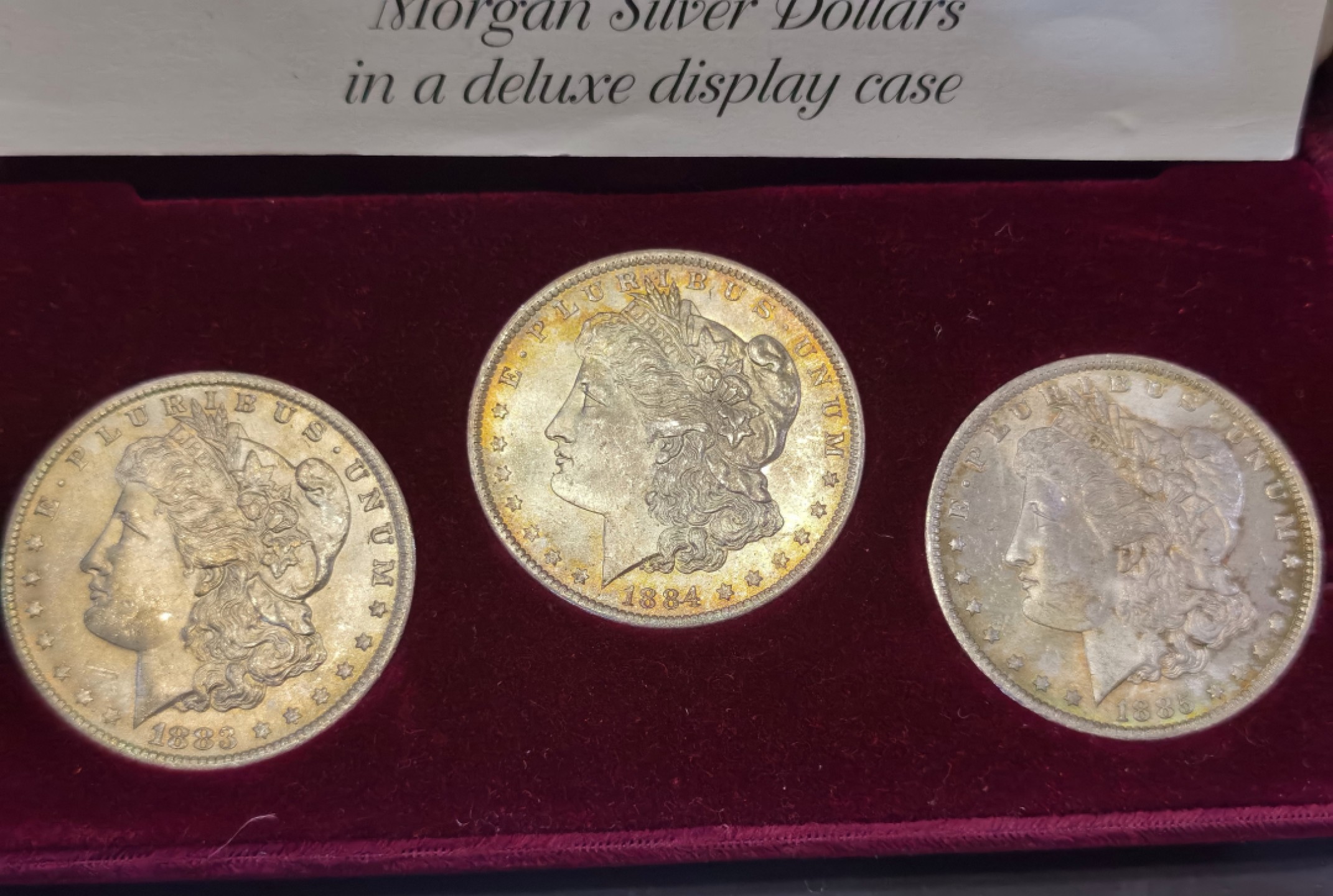 博洋堂世界钱币拍卖第016期（全场包邮） 美国1883 1884 1885年三枚O厂原盒摩根 带证书 三枚原为白币 长期在盒子内已经养出金彩 目测MS64