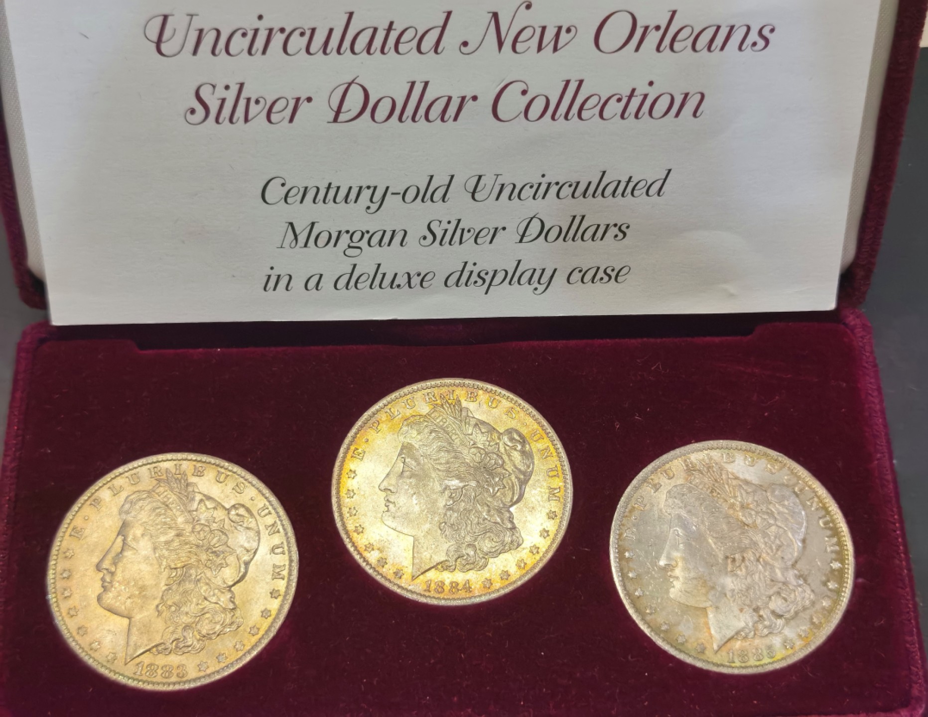 博洋堂世界钱币拍卖第016期（全场包邮） 美国1883 1884 1885年三枚O厂原盒摩根 带证书 三枚原为白币 长期在盒子内已经养出金彩 目测MS64