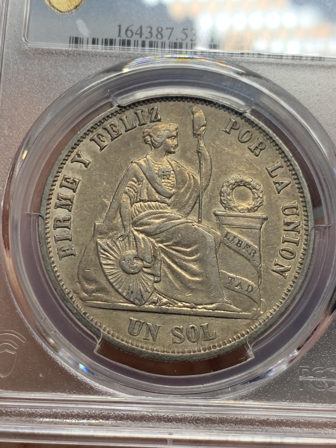 《竞宝斋》第136场-周日，周一连拍 (全场包邮) PCGS-AU53 秘鲁1865年1索尔坐人女神大银币 早期年份秘鲁坐人，同年更高分仅4枚 金彩包浆均匀靓丽，好彩难得