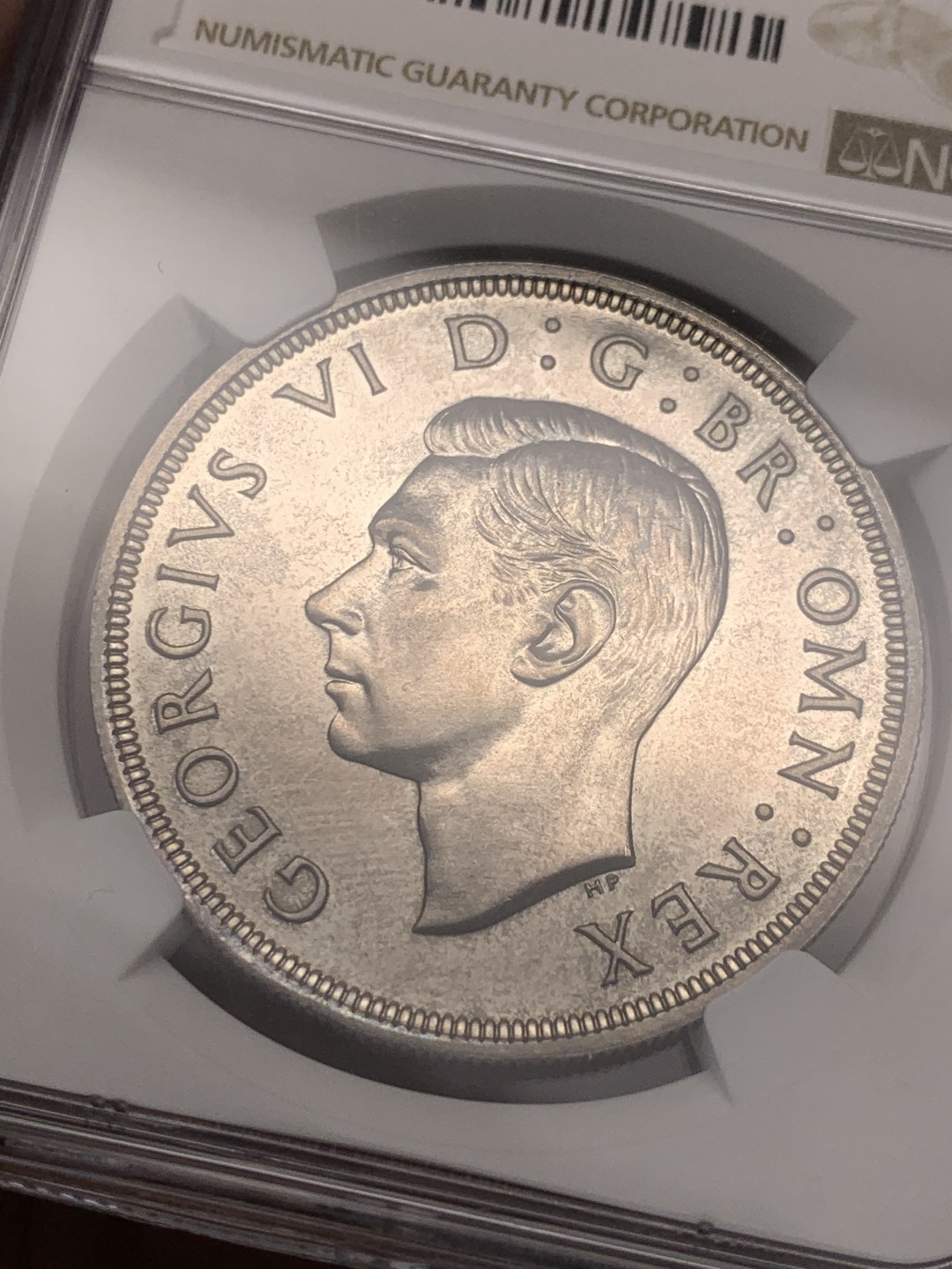 《竞宝斋》第136场-周日，周一连拍 (全场包邮) NGC-PF64 英国 1937年乔治六世精制一克朗银币 全新镜面光状态