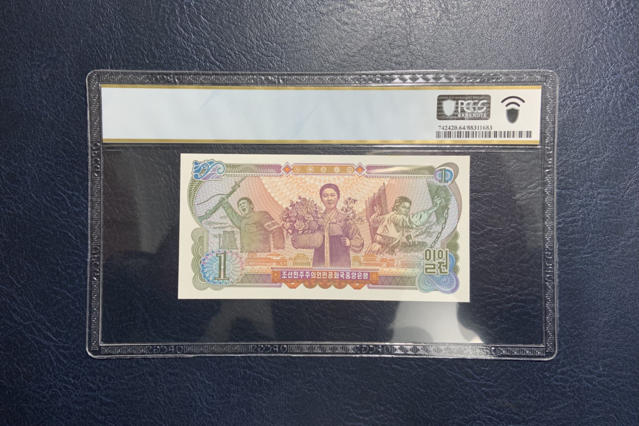 收藏联盟Quantum Auction 第234期拍卖 朝鲜1978(2003)年1元纪念钞 PCGS64 劳动党成立55周年黑色英文版