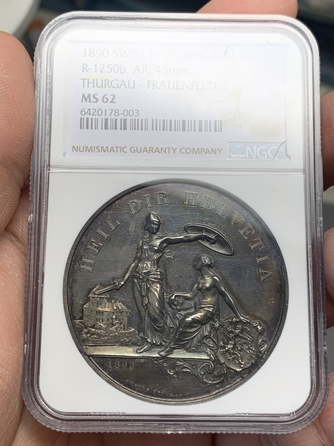《竞宝斋》第136场-周日，周一连拍 (全场包邮) NGC MS62 1890年瑞士弗劳恩菲尔德射击节银章，镜面底板，高点俱在，低评，藏家原盒拆出送评（附原盒）