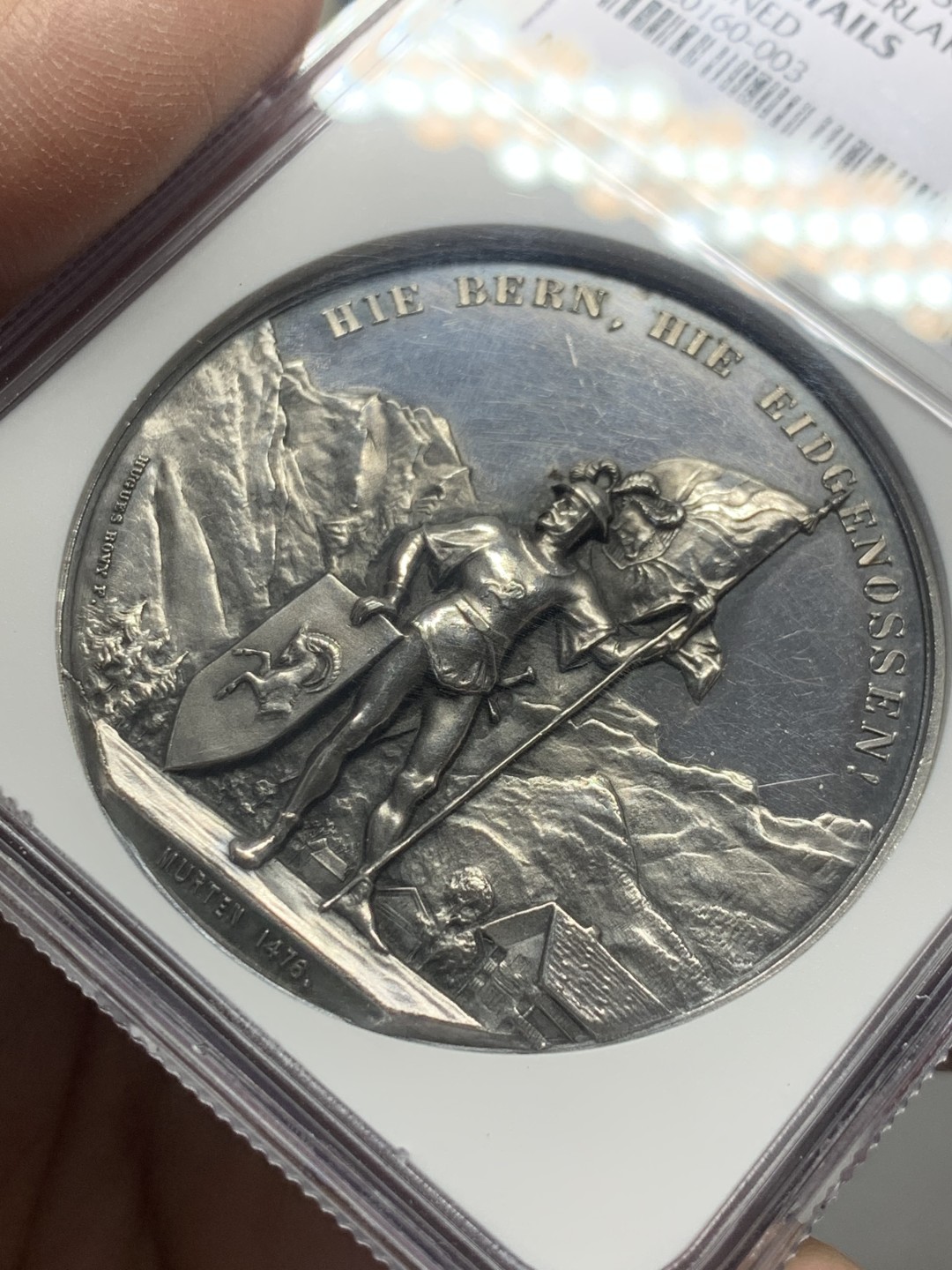 《竞宝斋》第136场-周日，周一连拍 (全场包邮) NGC UND 1888年瑞士因特拉尔肯射击节银章，稀少品种，五彩包浆，镜面底板，可以再试试