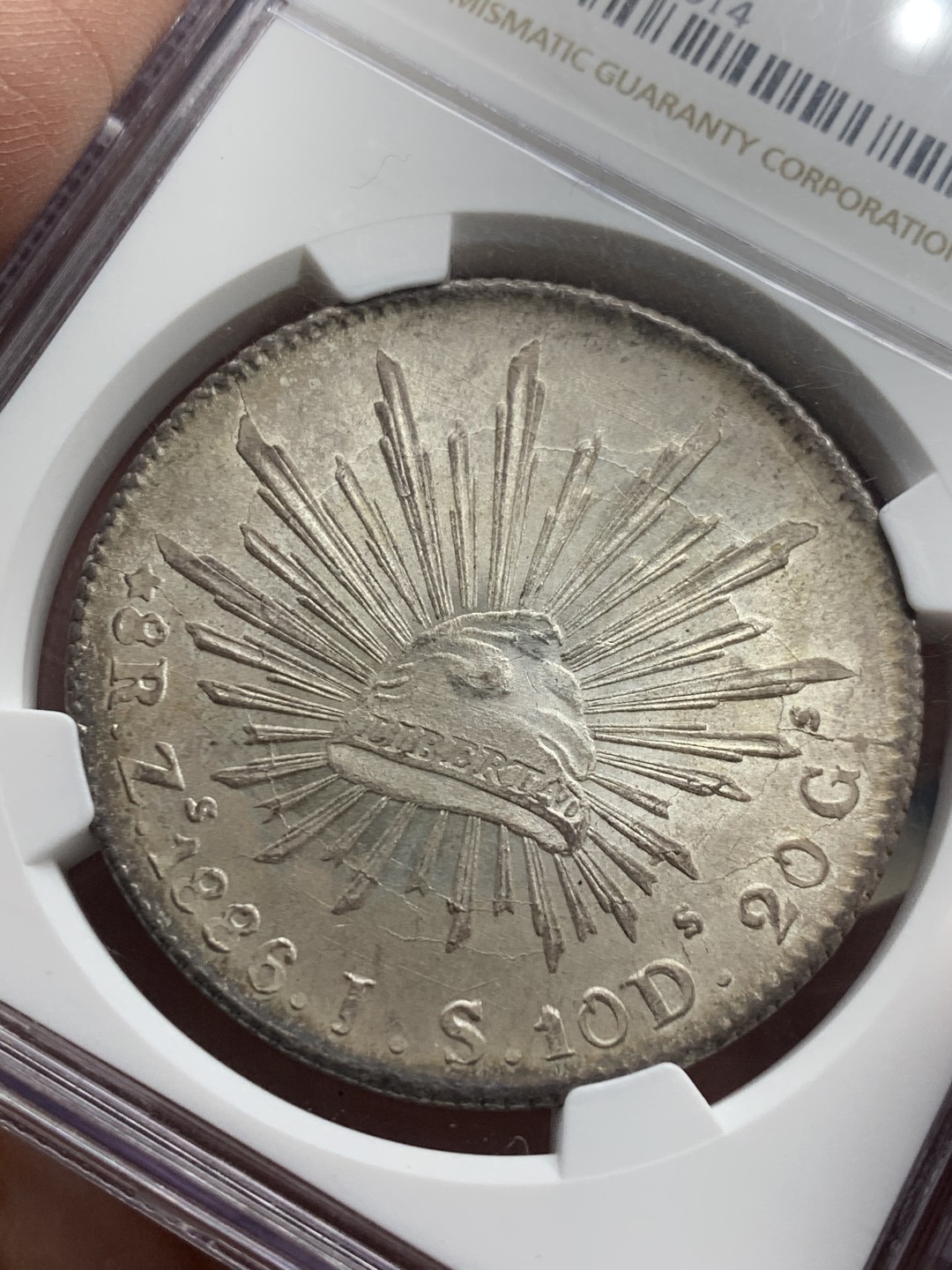 《竞宝斋》第136场-周日，周一连拍 (全场包邮) 冠军分 NGC MS66 墨西哥 1886年ZS JS 8R 鹰洋 整体粉光 打制清晰 帽中褶皱都非常的清晰 难得佳品